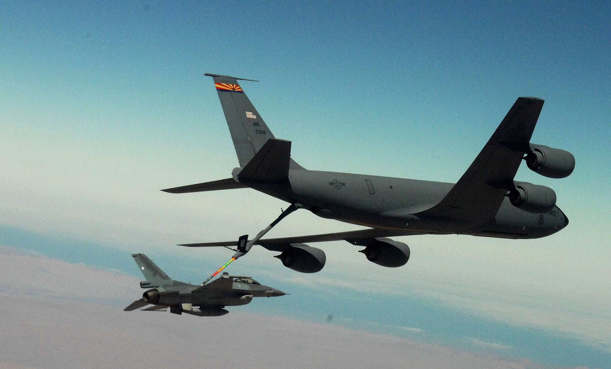 Aerial refuelers, like this KC-135 Stratotanker refueling an F-16 Fighting Falcon, keep coalition aircraft in the fight to support operations Iraqi Freedom and Enduring Freedom.  Air Force tanker crews flew 50 sorties and offloaded approximately 3.3 million pounds of fuel to 305 receiving aircraft. (U.S. Air Force photo/Master Sgt. Bill Kimble)