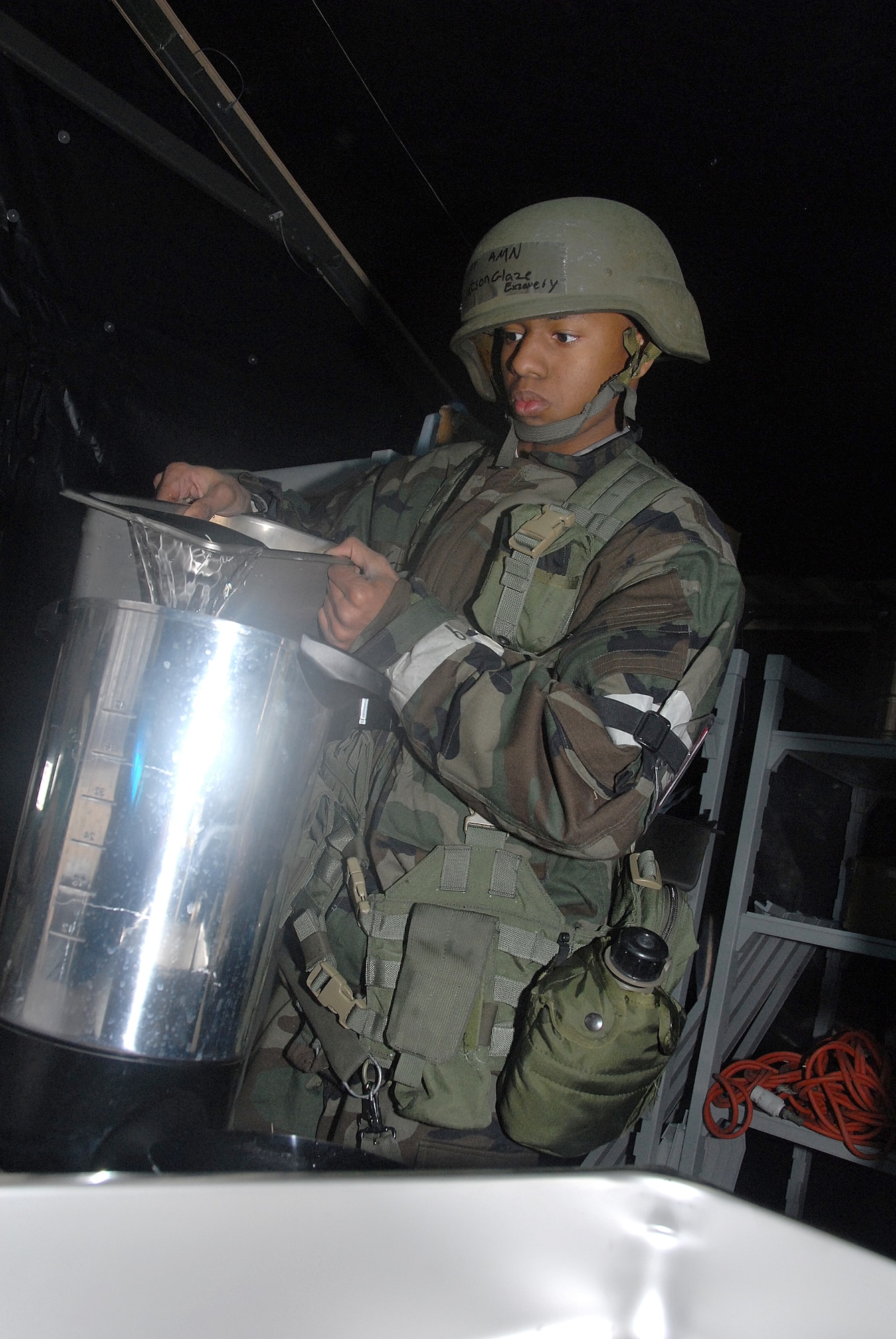Air Force reservist, Airman Exzavery Watsonglaze, a food-services journeyman with the 442nd Services Flight, prepares morning coffee for fellow reservists during an operational-readiness exercise at Whiteman Air Force Base, Mo. The flight's parent unit, the 442nd Fighter Wing, is an Air Force Reserve A-10 Thunderbolt II unit based at Whiteman. (US Air Force photo/Master Sgt. Bill Huntington)