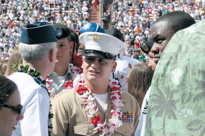 Gunnery Sgt. Carlos A. Martinez, company gunnery sergeant, Wounded Warriors Company, was one of four wounded service members who participated in the NFL Pro Bowl coin toss Sunday at Aloha Stadium. Martinez was injured Dec. 31, 2005, while deployed in support of Operation Iraqi Freedom.