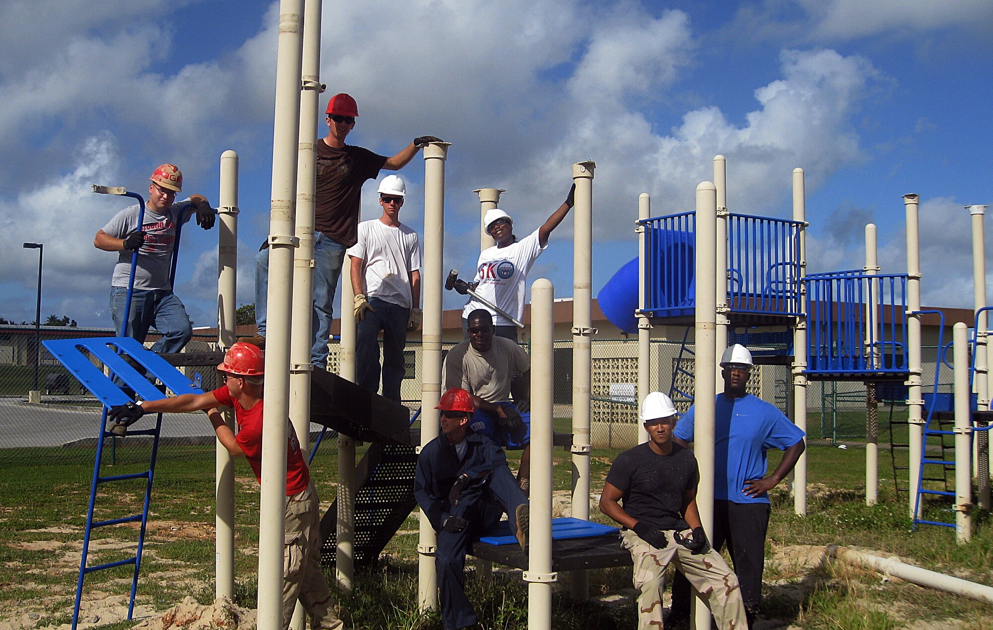 ANDERSEN AIR FORCE BASE, Guam -- Recently 12 Team Andersen volunteers from 36th Force Support Squadron, 554th RED HORSE Squadron, 36th Munitions Squadron, 36th Civil Engineer Squadron, 36th Logistics Readiness Squadron and youth center staff tore down a playground that has been a safety hazard for over five years. The playground, located near Chapel two, Outdoor Recreation and the Child Development Center, was damaged when Typhoons Chataan and Pongsona hit Guam in 2002. (Courtesy photo)