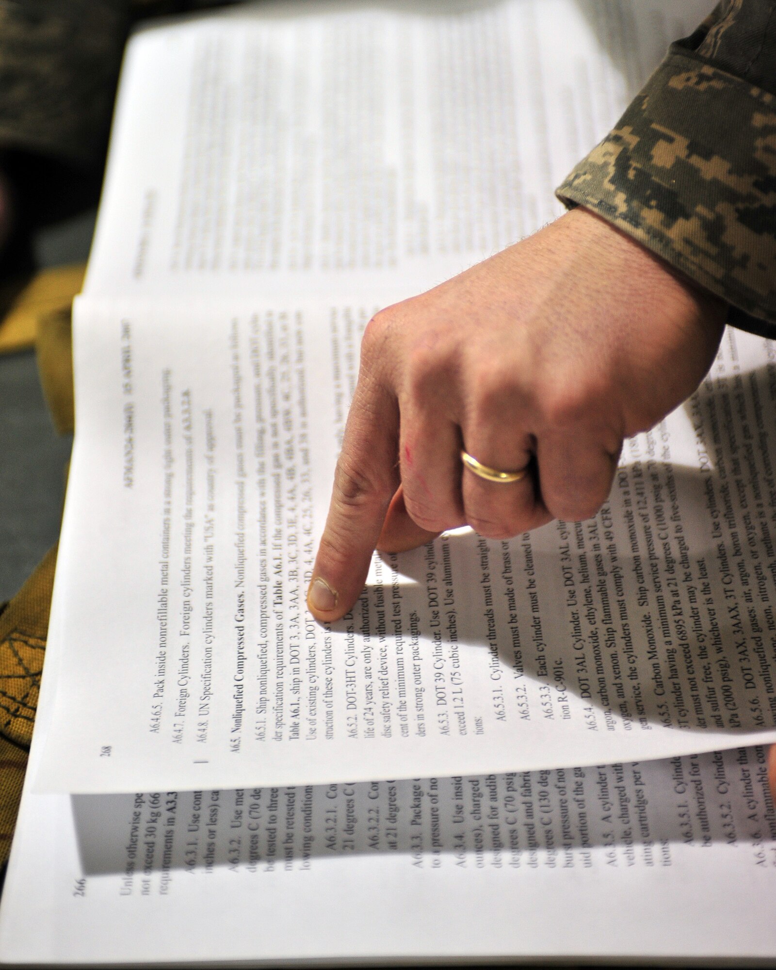 An Airman from the 354th Logistics Readiness Squadron researches material safety data sheet information during an operational readiness exercise Feb. 9, 2009. An MSDS gives important information on a chemical, describing proper handling, safety, emergency and storage procedures. (U.S Air Force photo/Airman 1st Class Willard E. Grande II)