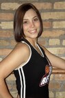 MINOT AIR FORCE BASE, N.D. -- Senior Airman Ashley Woods, an alternate resource advisor with  the 91st Security Forces Group, and until recently, a dance member for the Minot SkyRockets, poses for a picture in her official official Rockettes dance team uniform. (Courtesy photo)