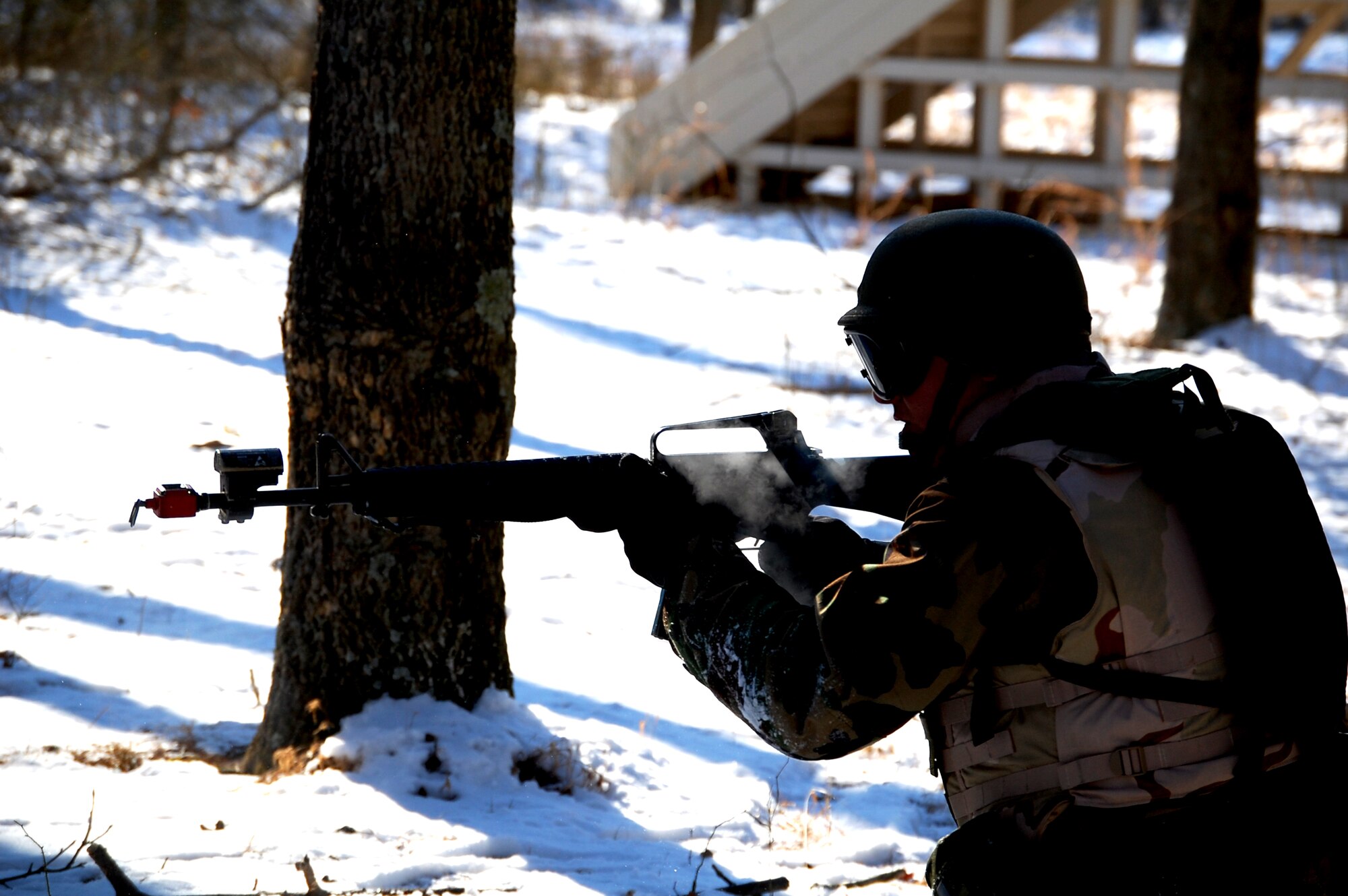 A student in the Advanced Contingency Skills Training Course responds to a scenario during a training session in combat first aid on Feb. 5, 2009, on a Fort Dix, N.J., range.  ACST is taught by the U.S. Air Force Expeditionary Center's 421st Combat Training Squadron and prepares Airmen for upcoming deployments.  (U.S. Air Force Photo/Tech. Sgt. Scott T. Sturkol)