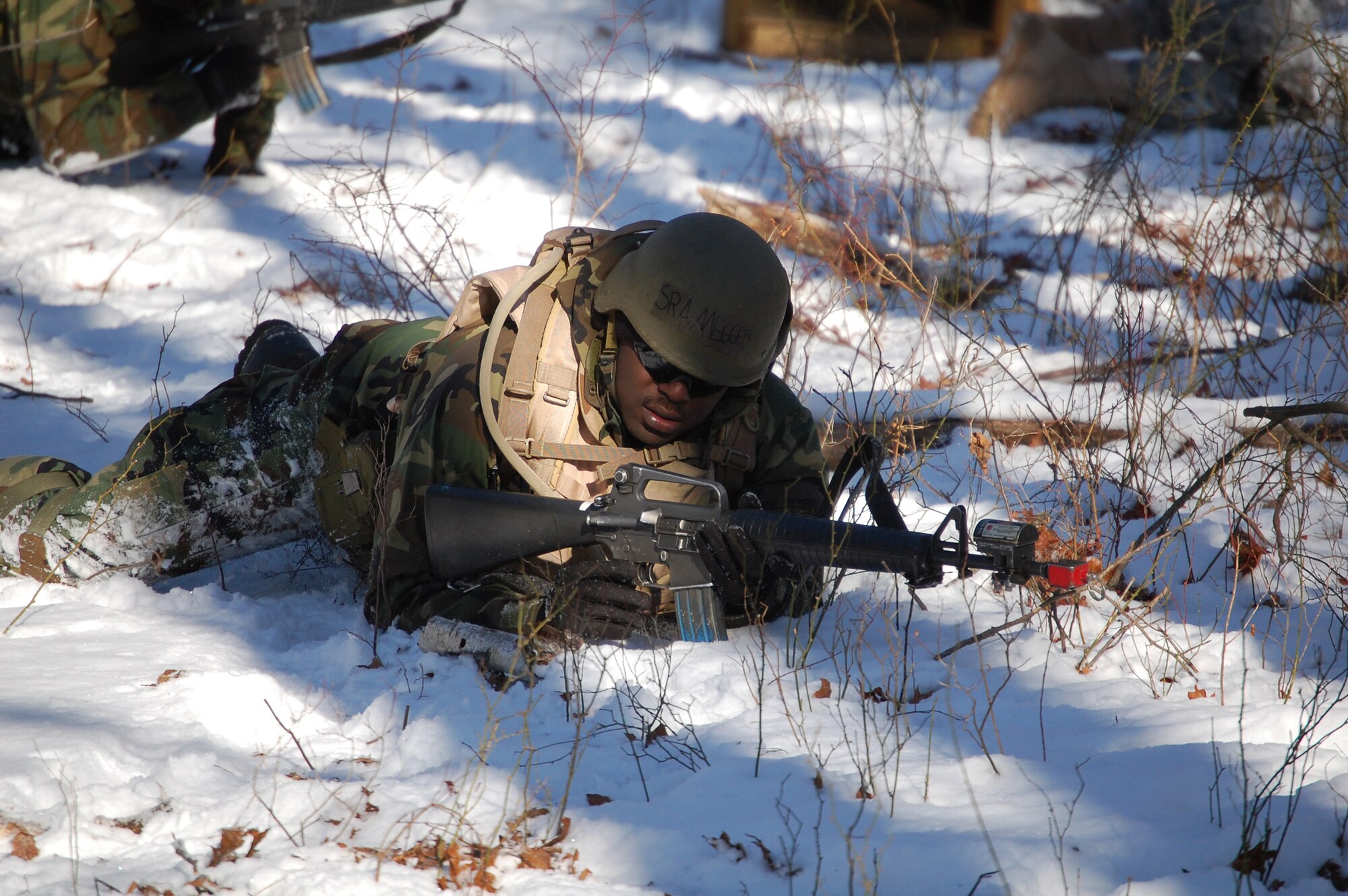 A student in the Advanced Contingency Skills Training Course responds to a scenario during a training session in combat first aid on Feb. 5, 2009, on a Fort Dix, N.J., range.  ACST is taught by the U.S. Air Force Expeditionary Center's 421st Combat Training Squadron and prepares Airmen for upcoming deployments.  (U.S. Air Force Photo/Tech. Sgt. Scott T. Sturkol)