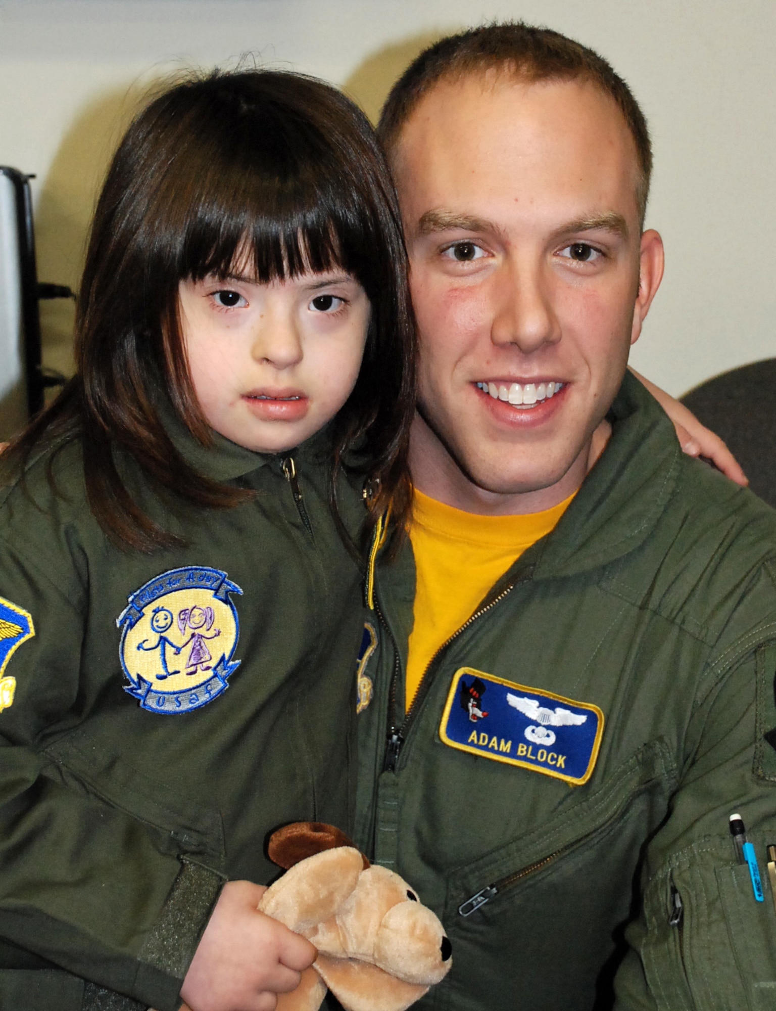 LAUGHLIN AIR FORCE BASE, Texas -- Pilot for a day,Angel del Cielo Aguilar, poses for a picture with 2nd Lt. Adam Block, 86th Flying Training Squadron, after her tour of Laughlin and her day to be a pilot here recently. (U.S. Air Force photo by Tech. Sgt. Joel Langton)