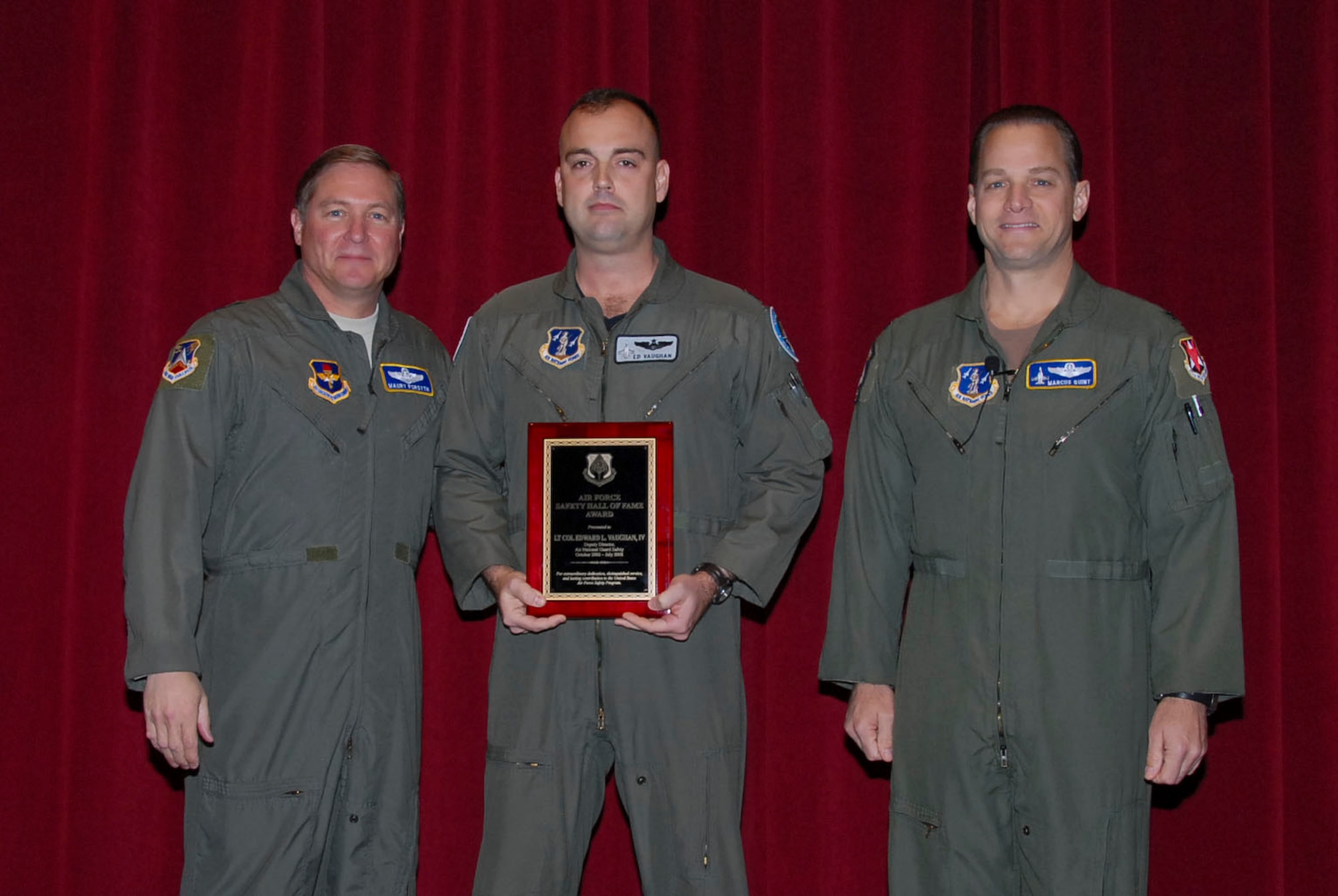 Lt. Col. Ed Vaughan (center) is inducted into the Air Force Safety Hall of Fame in a ceremony Feb. 6.  With him are (left) Maj. Gen. Maury Forsyth, commander of the Spaatz Center at Maxwell Air Force Base, Ala., and Col.
Marcus Quint, chief of the Air National Guard Safety Directorate. (Air Force photo by Jamie Pitcher)
