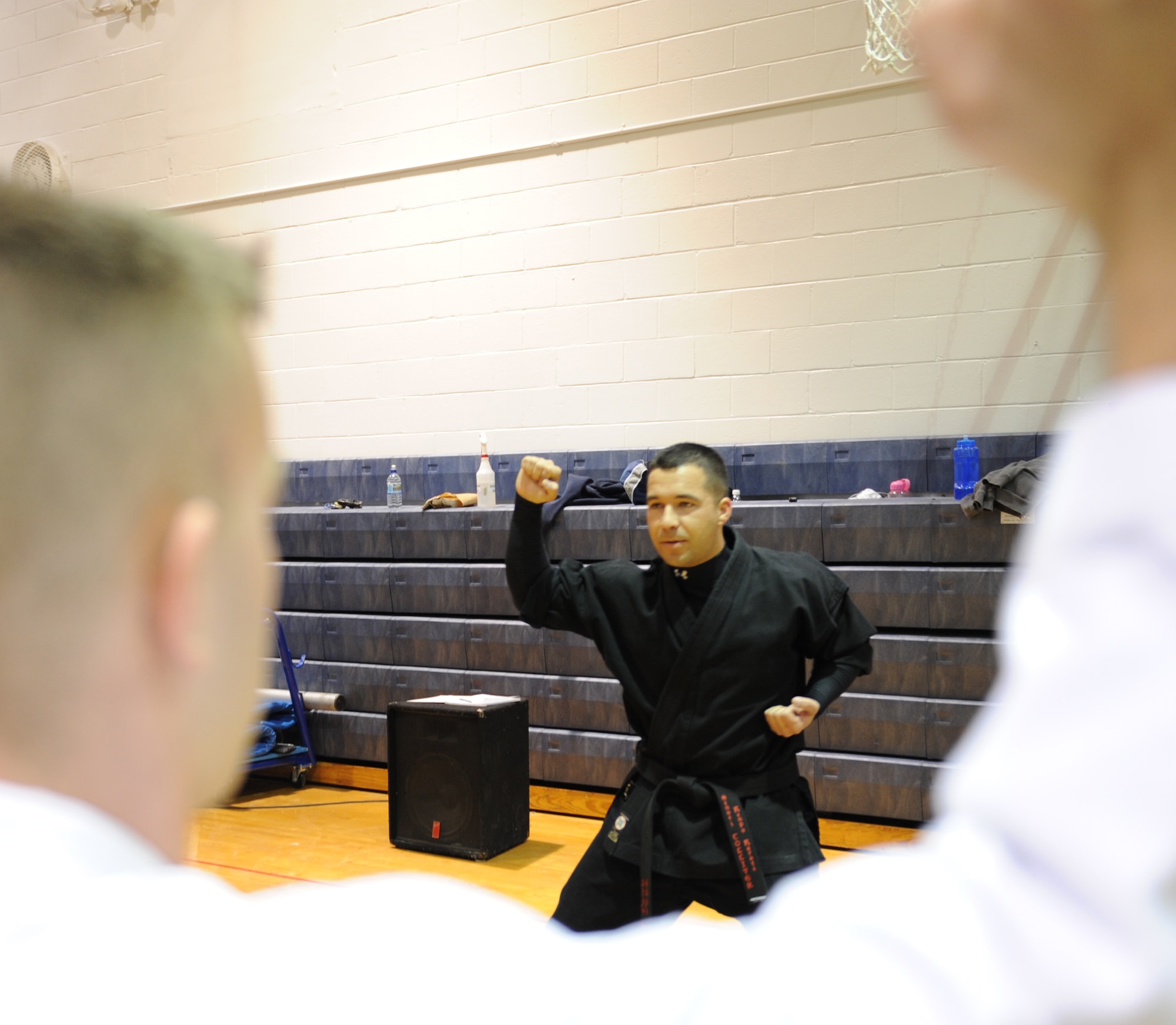WHITEMAN AIR FORCE BASE, Mo. – Sensei Larry Tolliver, Kenpo Instructor, critics his students as they perform an inward block Feb. 2. Kenpo is a Japanese term that translates to mean “Law of the Fist.” Classes are Mondays and Wednesdays from 5 – 6 p.m. at the fitness center for $8 a class. (U.S. Air Force photo/Senior Airman Stephen Linch)