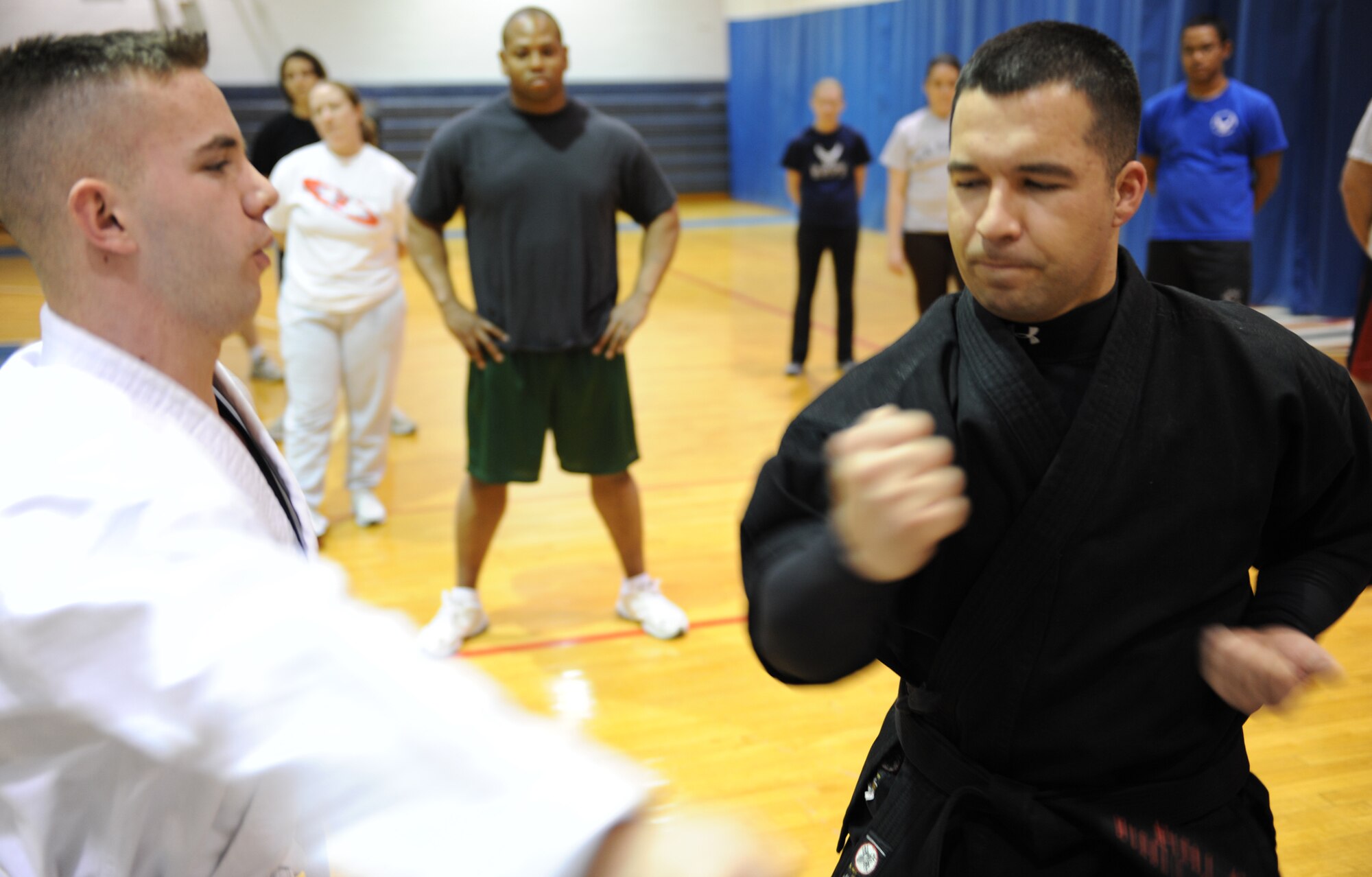WHITEMAN AIR FORCE BASE, Mo. – Sensei Larry Tolliver, Kenpo Instructor, blocks a punch from Senior Airman Cory Todd, a Kenpo student and member of the 509th Bomb Wing Public Affairs, during a demonstration for his class Feb. 2. Kenpo is a Japanese term that translates to mean “Law of the Fist.” Classes are Mondays and Wednesdays from 5 – 6 p.m. at the fitness center for $8 a class. (U.S. Air Force photo/Senior Airman Stephen Linch)