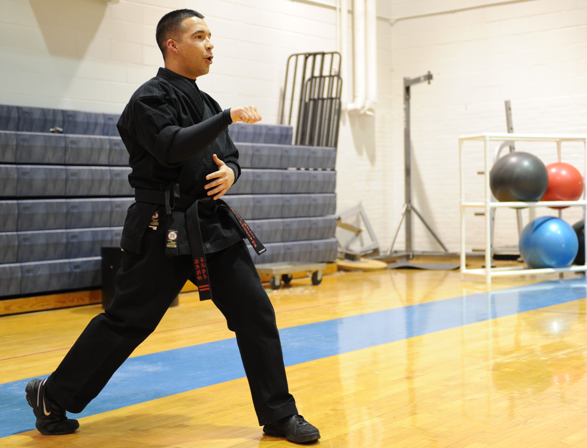 WHITEMAN AIR FORCE BASE, Mo. – Sensei Larry Tolliver, Kenpo Instructor, shows his class a soft bow stance Feb. 2. Kenpo is a Japanese term that translates to mean “Law of the Fist.” Classes are Mondays and Wednesdays from 5 – 6 p.m. at the fitness center for $8 a class. (U.S. Air Force photo/Senior Airman Stephen Linch)