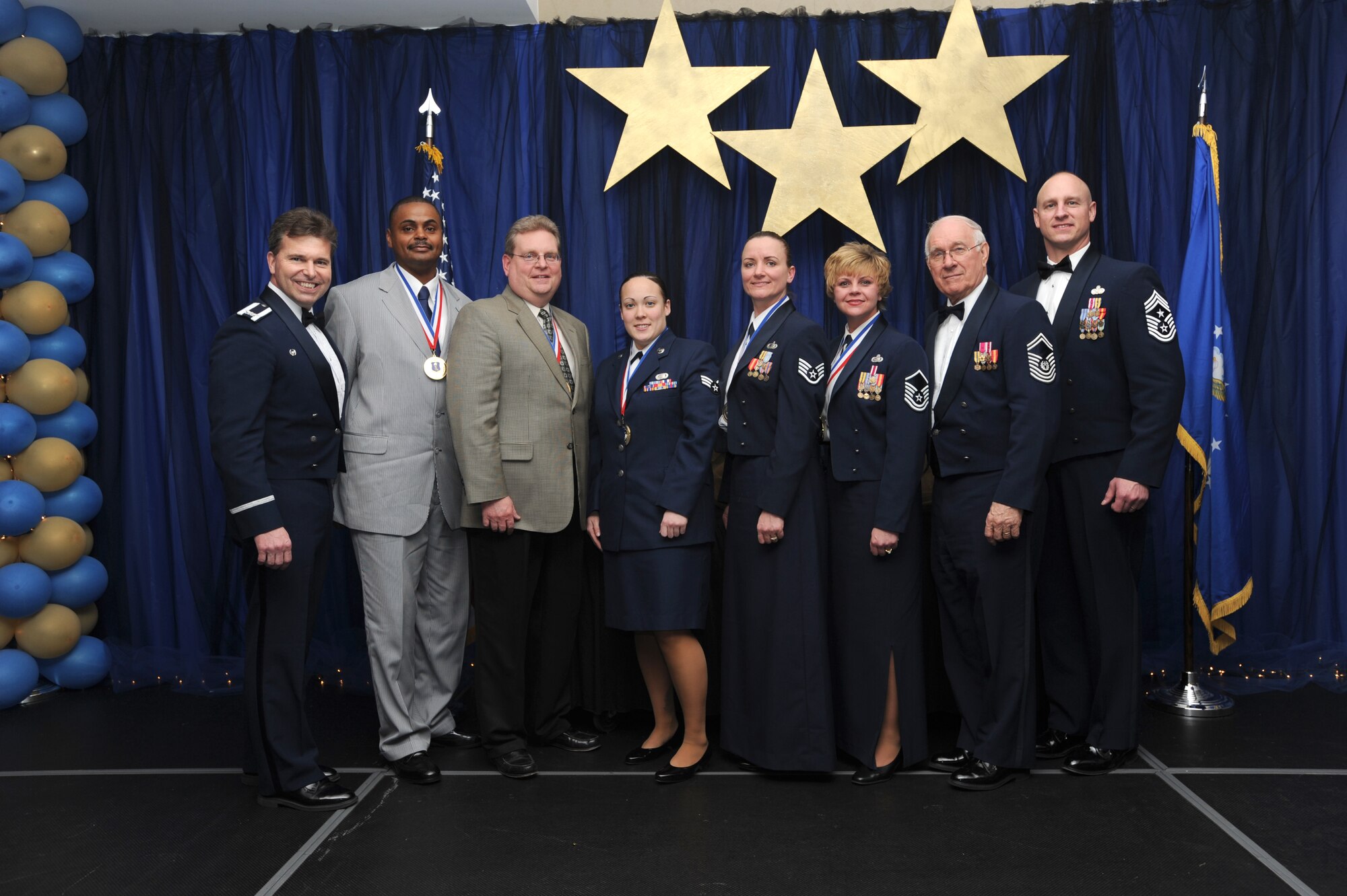 The 319th Air Refueling Wing commander, Col. John Michel (left), awarded the 2008 Annual Awards during a ceremony here Feb. 6. The winners are (from left to right):
Civilian category one: Terence Beasley, 319th Medical Support Squadron
Civilian category two: David McCullough, 319th Civil Engineer Squadron
Airman category: Senior Airman Kimberly Edmonds, 319th Force Support Squadron
NCO category: Staff Sgt. Samantha Birk, 319 FSS
Senior NCO category: Master Sgt. Shannon Rix, 319 FSS
(Not pictured)
Company grade officer category: Capt. Henry Moon, 319th Logistics Readiness Squadron
First sergeant category: Master Sgt. Brian Huber, 319 LRS
Honor guard: Staff Sgt. Jacob Gjesvold
(U.S. Air Force photo/Staff Sgt. Suellyn Nuckolls)
