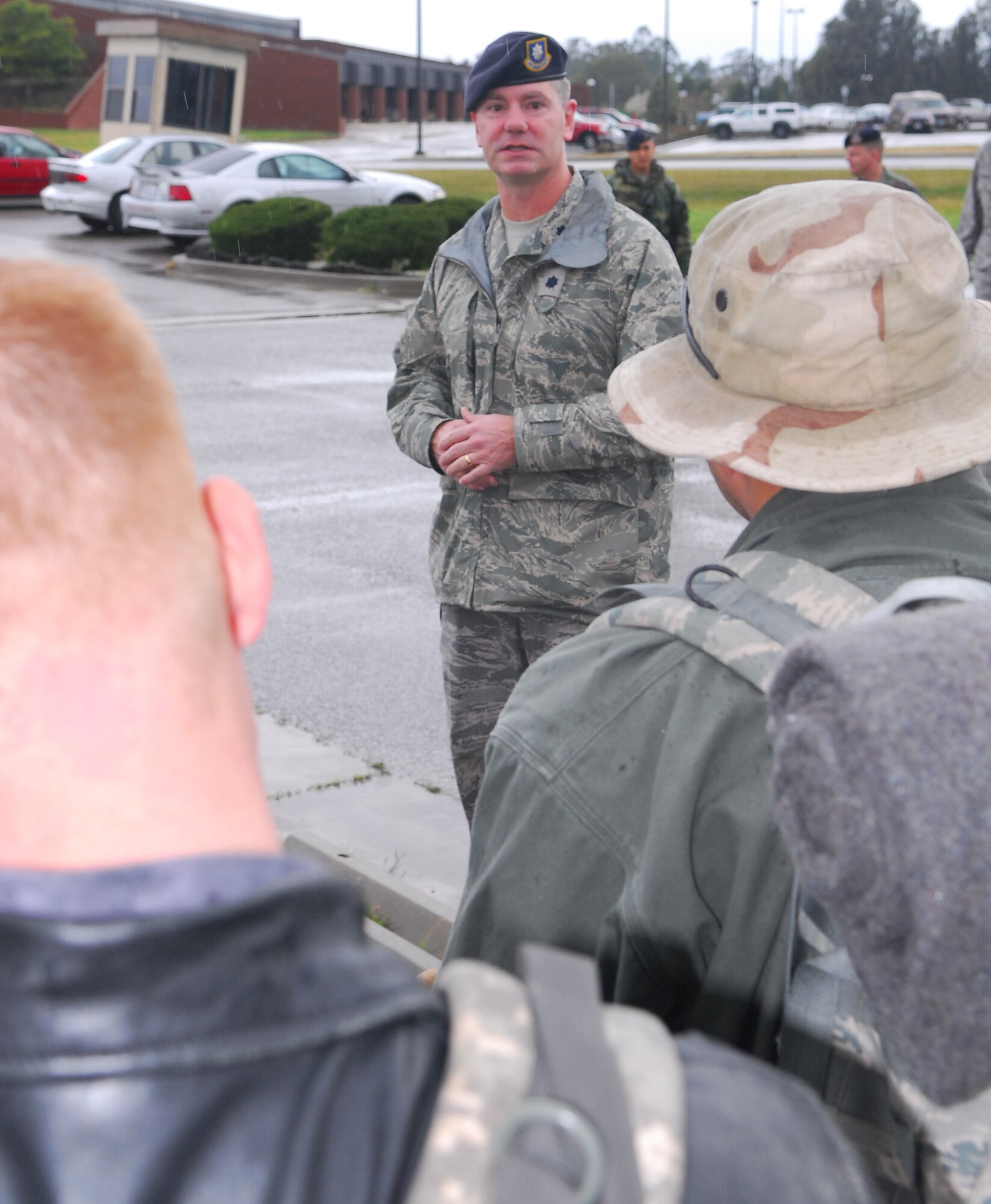 VANDENBERG AIR FORCE BASE, Calif. -- Lt. Col. Joseph Milner, 30th Space Wing Security Forces Squadron commander,  motivates his Airmen before they board a bus to depart Vandenberg for a deployment to Iraq Feb. 6.The 30th SFS sent a 13-member team on the six-month deployment. (U.S. Air Force photo/Airman 1st Class Steve Bauer)