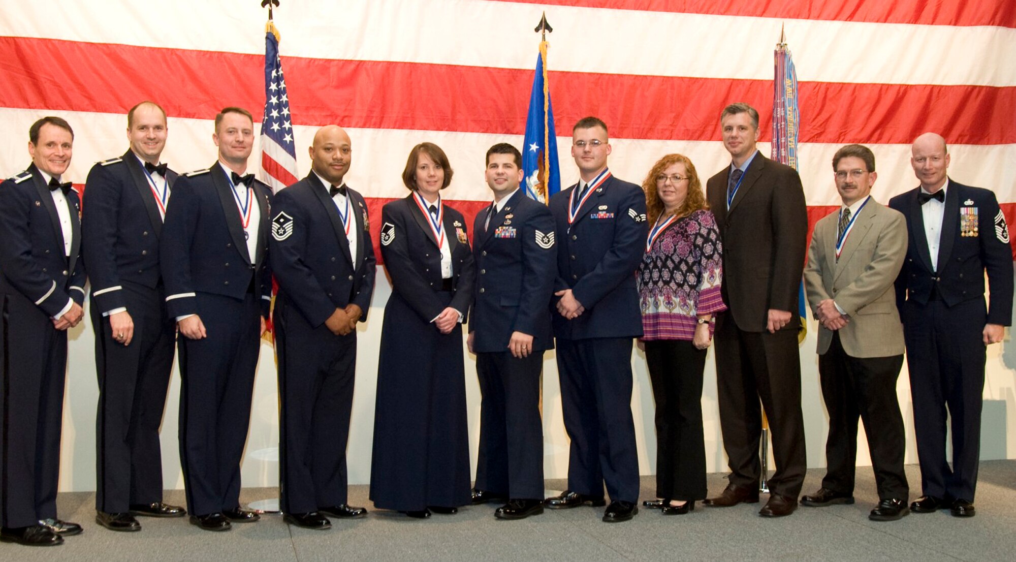 The 53d Wing held its annual awards Feb. 5 at the Emerald Coast Conference Center in Fort Walton Beach, Fla.  Members from many of the 17 different geographically separated units came down to be a part of the annual event.  The award ceremony is the climax of week long activities for the 53d Wing that include the Senior Enlisted Leadership Conference and the Commanders Conference.  (From left to right) Col. Steve DePalmer, commander, Maj. Ryan Keeney (FGO) 85th Test and Evaluation Squadron, Capt. Marcus Kraushaar (CGO), 49th Test and Evaluation Squadron, Master Sgt. Phillip Folson Jr. (first sergeant), 31st Test and Evaluation Squadron, Master Sgt. Julie Morris (SNCO), 16th Electronic Warfare Squadron, Tech. Sgt. Casey Cota (NCO), 68th Electronic Warfare Squadron, Senior Airman Bradley Scott (Amn), Det. 1 16th Electronic Warfare Squadron, Rita Tyree (Cat II), 86th Fighter Weapons Squadron, Grant Burris (Cat IV), 83rd Fighter Weapons Squadron, Michael Godfrey (Cat V) 36th Electronic Warfare Squadron and Chief Master Sgt. Terry West, command chief.  Not pictured:  Leslie Kent (Cat III), 59th Test and Evaluation Squadron.  (Courtesy photo)