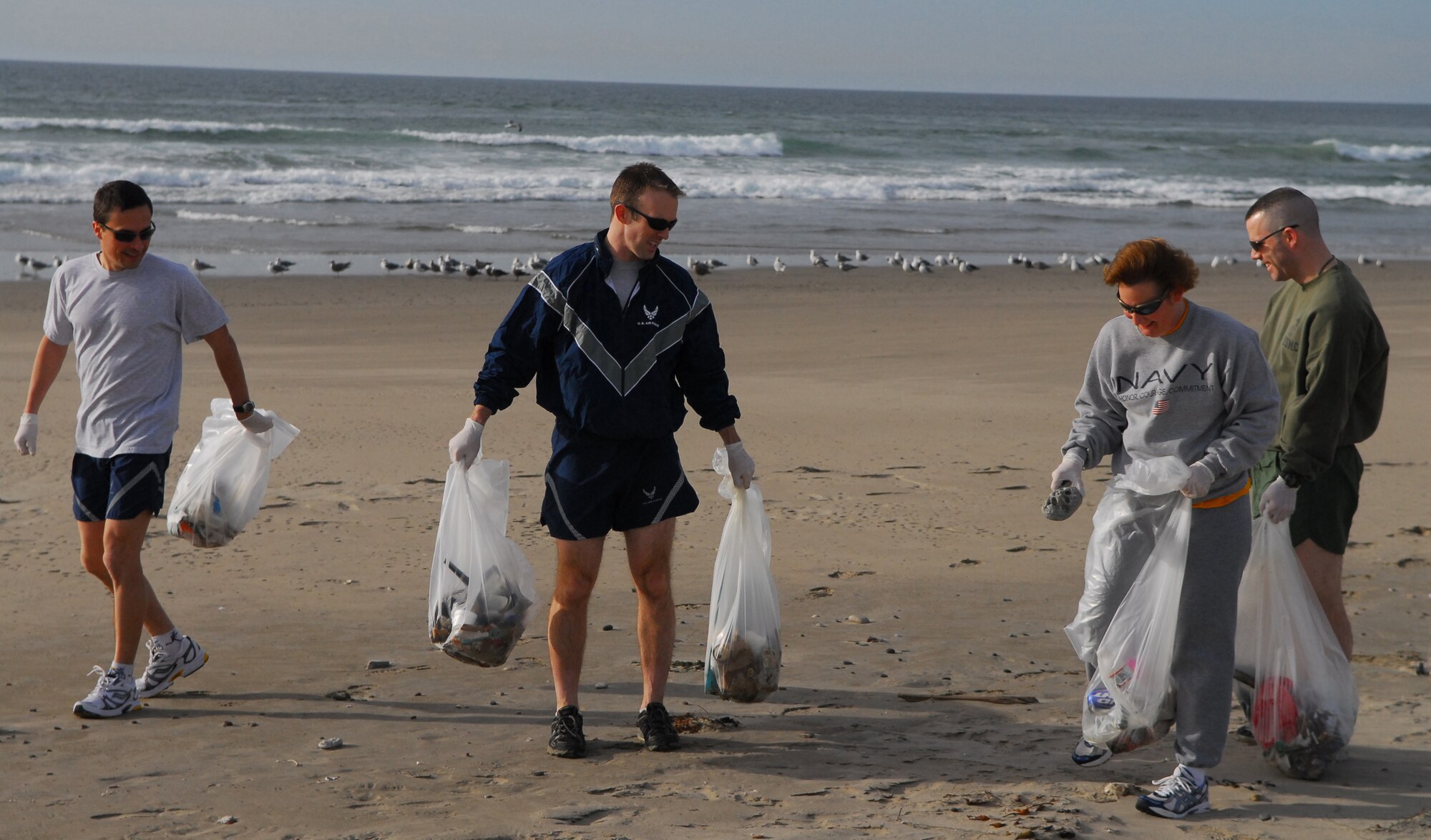 VANDENBERG AIR FORCE BASE, Calif. -- Members from the Joint Functional Component Command for Space walk along Vandenberg's coast to incorporate a public service activity, picking up and properly disposing trash the group found on the beach, with a scheduled physical training session Feb. 5 at Surf Beach. (U.S. Air Force photo/Airman 1st Class Steve Bauer)