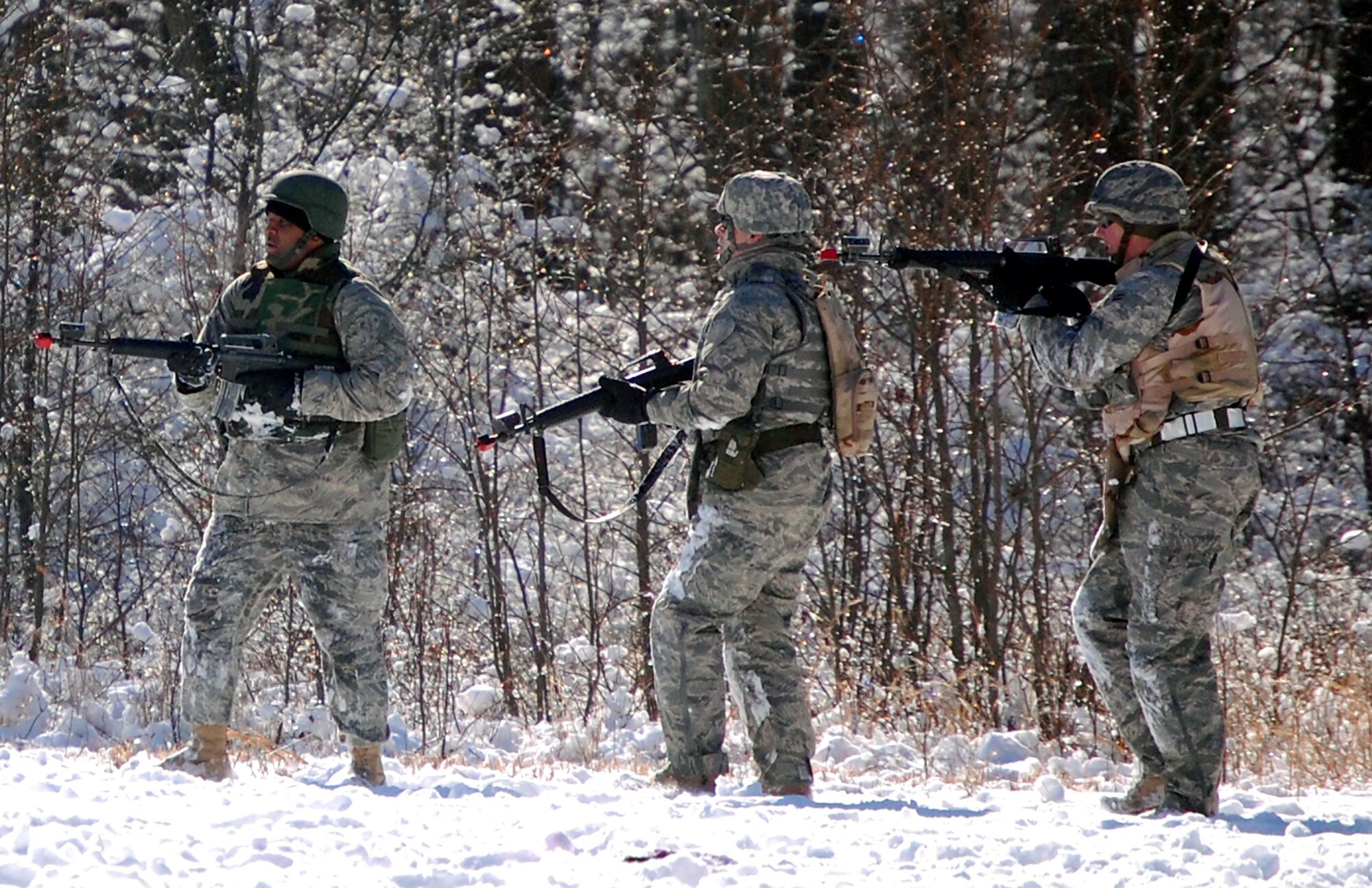 Airmen in the Advanced Contingency Skills Training Course practice a patrolling and tactics response Feb. 4, 2008, during training on a Fort Dix, N.J., range.  The course, taught by the U.S. Air Force Expeditionary Center's 421st Combat Training Squadron, prepares Airmen for upcoming deployments to areas such as Iraq and Afghanistan.  The students learn advanced combat skills in convoy operations, military operations in urban terrain and related training.  (U.S. Air Force Photo/Tech. Sgt. Scott T. Sturkol)