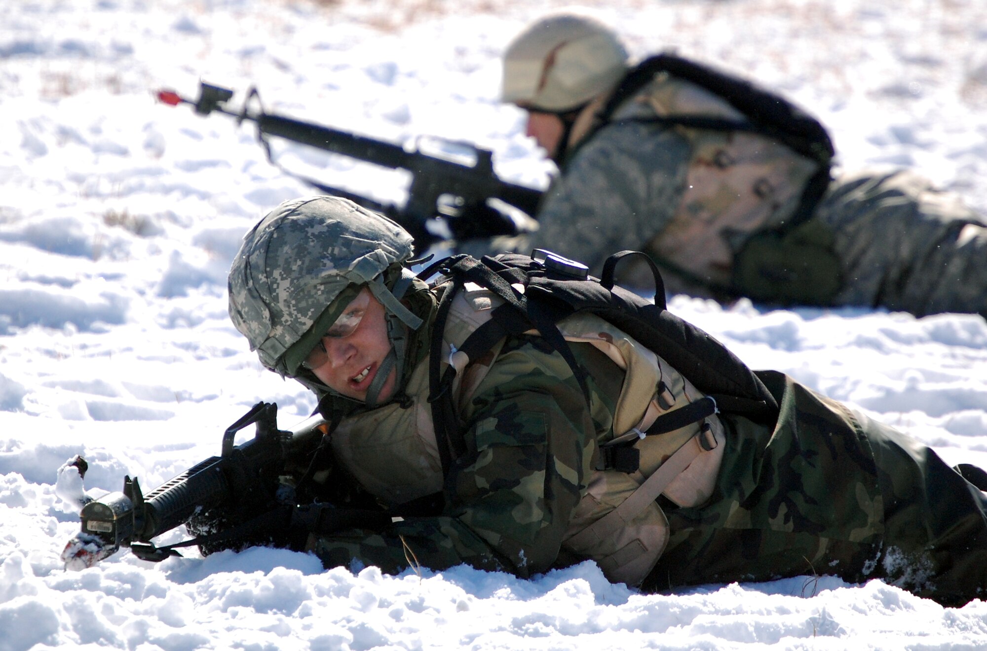 Airmen in the Advanced Contingency Skills Training Course practice a patrolling and tactics response Feb. 4, 2008, during training on a Fort Dix, N.J., range.  The course, taught by the U.S. Air Force Expeditionary Center's 421st Combat Training Squadron, prepares Airmen for upcoming deployments to areas such as Iraq and Afghanistan.  The students learn advanced combat skills in convoy operations, military operations in urban terrain and related training.  (U.S. Air Force Photo/Tech. Sgt. Scott T. Sturkol)