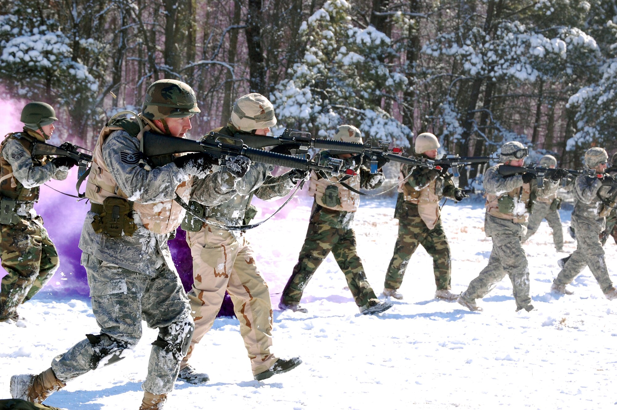 Airmen in the Advanced Contingency Skills Training Course practice a patrolling and tactics response Feb. 4 during training on a Fort Dix, N.J., range.  The course, taught by the U.S. Air Force Expeditionary Center's 421st Combat Training Squadron, prepares Airmen for upcoming deployments to areas such as Iraq and Afghanistan.  The students learn advanced combat skills in convoy operations, military operations in urban terrain and related training.  (U.S. Air Force Photo/Tech. Sgt. Scott T. Sturkol)