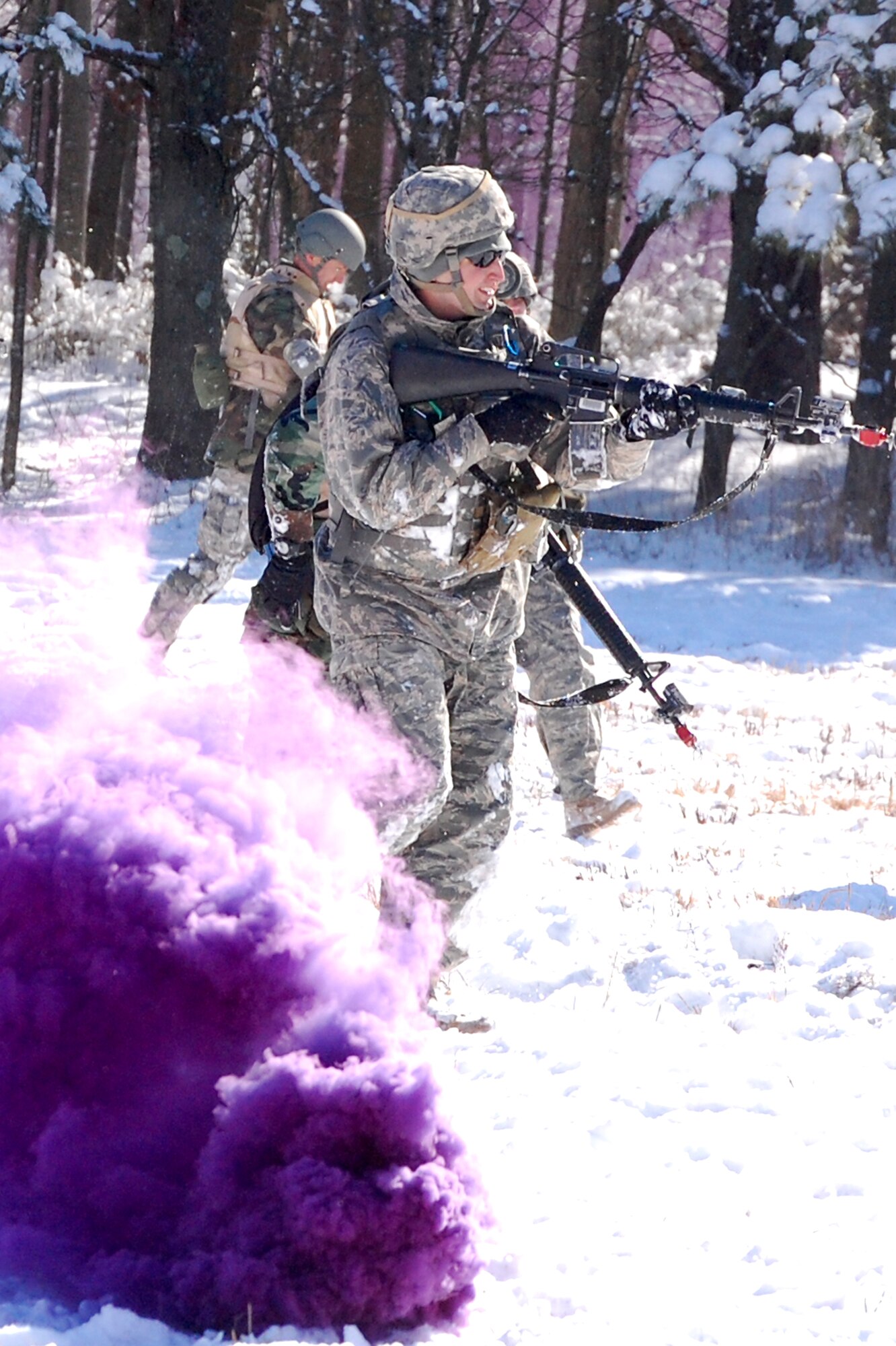 An Airman in the Advanced Contingency Skills Training Course practices a patrolling and tactics response Feb. 4, 2008, during training on a Fort Dix, N.J., range.  The course, taught by the U.S. Air Force Expeditionary Center's 421st Combat Training Squadron, prepares Airmen for upcoming deployments to areas such as Iraq and Afghanistan.  The students learn advanced combat skills in convoy operations, military operations in urban terrain and related training.  (U.S. Air Force Photo/Tech. Sgt. Scott T. Sturkol)