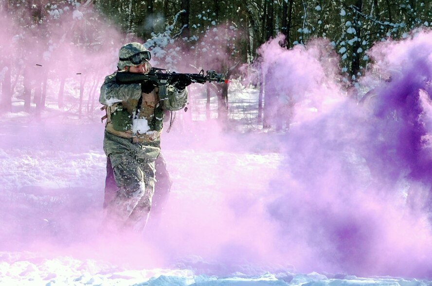 An Airman in the Advanced Contingency Skills Training Course practices a patrolling and tactics response Feb. 4 during training on a Fort Dix, N.J., range.  The course, taught by the U.S. Air Force Expeditionary Center's 421st Combat Training Squadron, prepares Airmen for upcoming deployments to areas such as Iraq and Afghanistan.  The students learn advanced combat skills in convoy operations, military operations in urban terrain and related training.  (U.S. Air Force Photo/Tech. Sgt. Scott T. Sturkol)