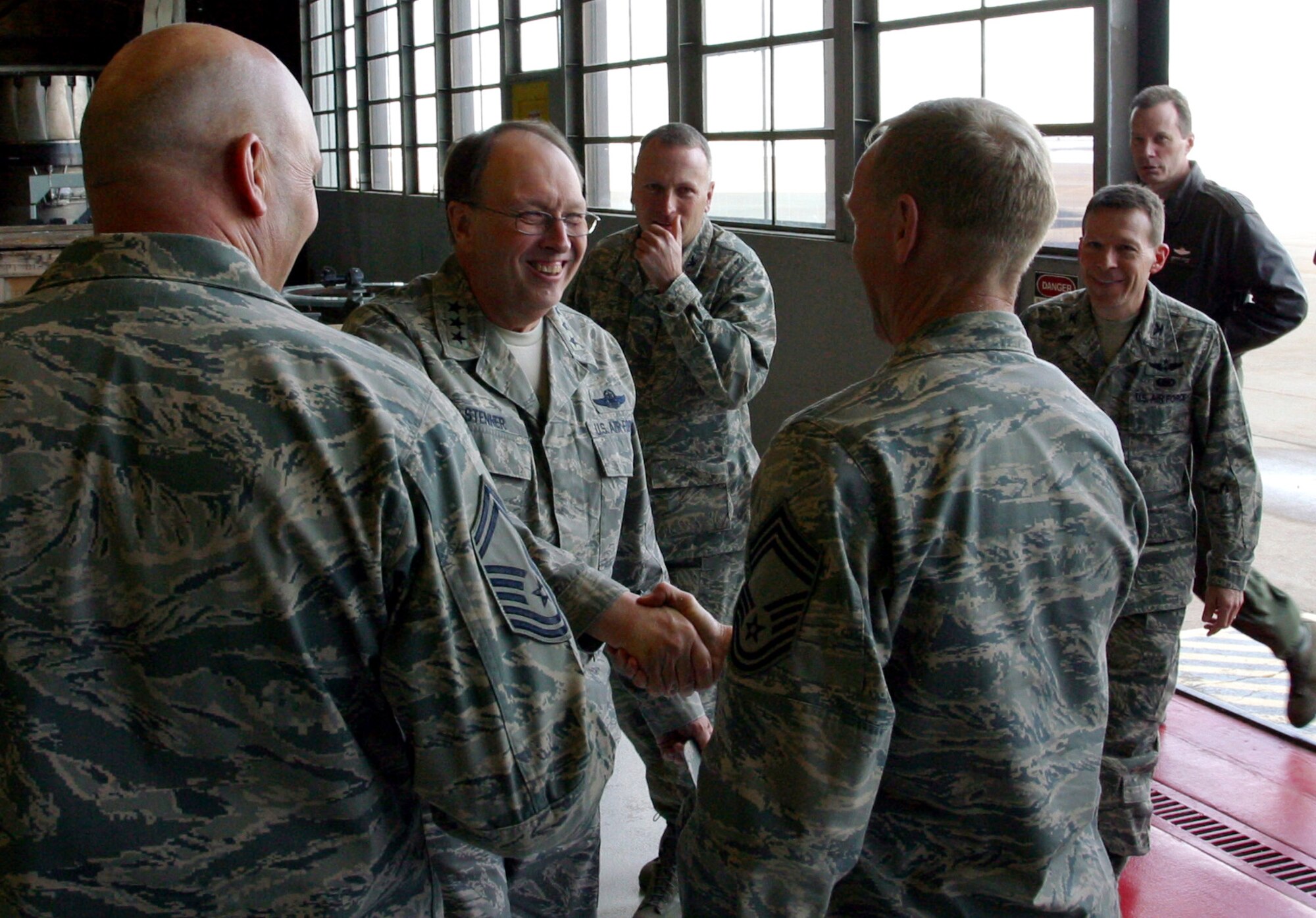 Lt. Gen. Charles E. Stenner, Jr., Chief of Air Force Reserve and Commander of Air Force Reserve Command, greets Chief Master Sgt. Kerry Robbins of the 419th Maintenance Squadron during a tour Saturday. The general visited Hill Air Force Base this weekend to review the 419th Fighter Wing’s facilities and personnel, and to speak at the wing’s Outstanding Airmen of the Year awards banquet. (U.S. Air Force photo/Senior Airman Brandon Craig)