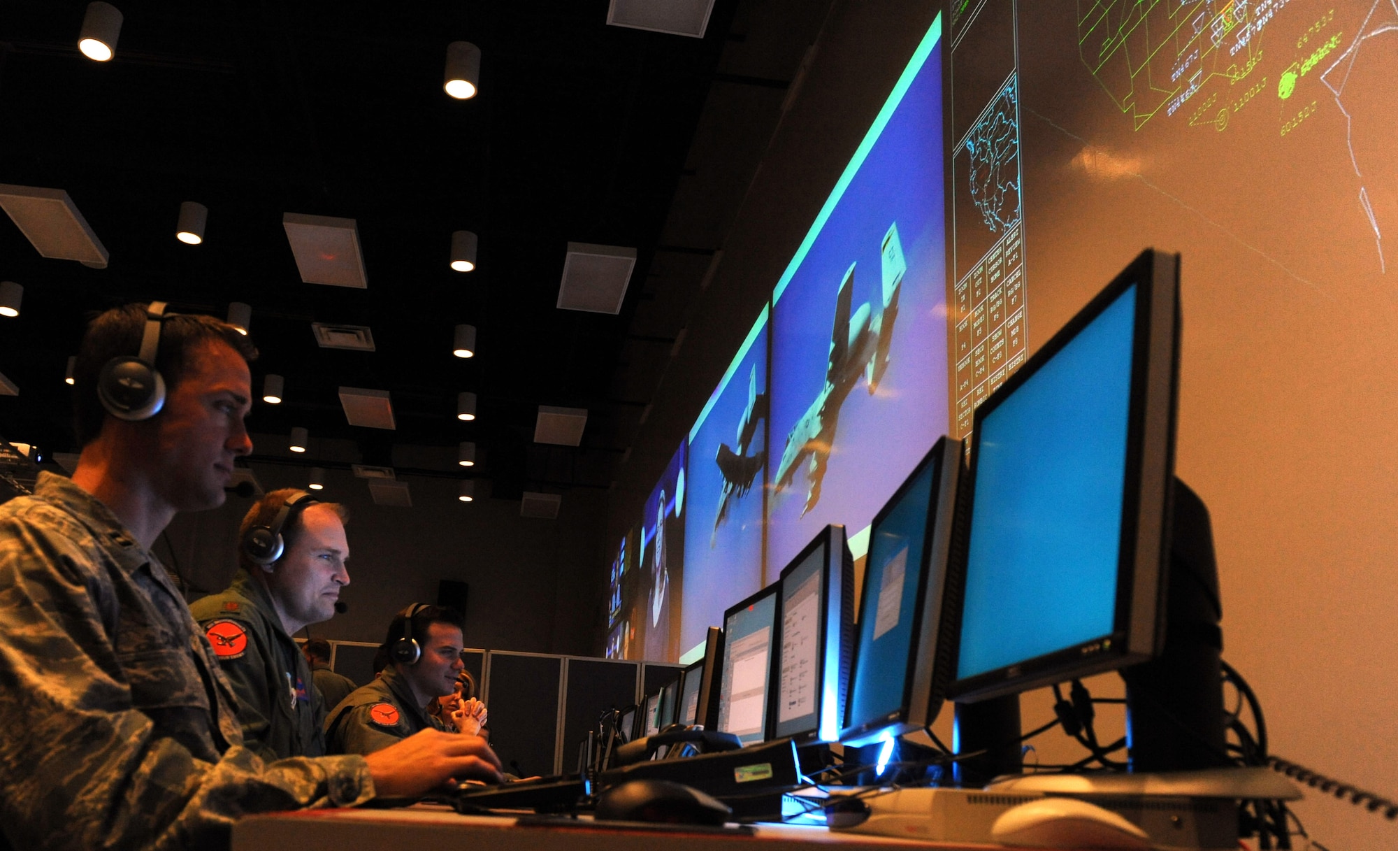 A Combat Operations Division team processes information for exploitation and prosecution of dynamic and time sensitive targets at the Combined Air and Space Operations Center at Nellis (CAOC-N) AFB, Nev., during a recent Red Flag exercise. The CAOC-N is operated by the 505th Operations Squadron, a geographically separated unit of the 505th Command and Control Wing at Hurlburt Field.