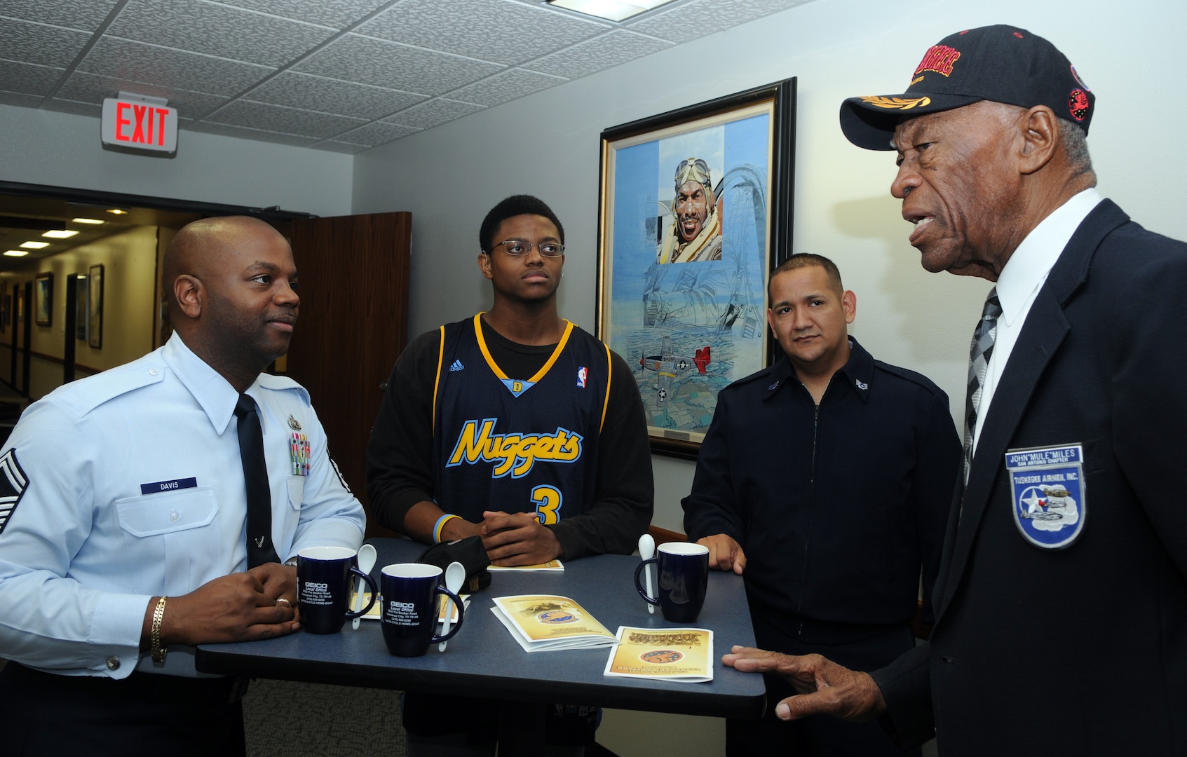 John "Mule" Miles, a Tuskegee Airman aircraft mechanic and former Negro Baseball League Chicago American "Giants" baseball player, speaks with guests at the First Tuskegee Heritage Breakfast Feb. 9 at the 99th Flying Training Squadron. Activated on March 22, 1941, the 99th FTS was originally designated as the 99th Pursuit Squadron, and was better known as the "Tuskegee Airmen," the first all-black unit in the U.S. Army Air Corps. (U.S. Air Force photo by Rich McFadden)