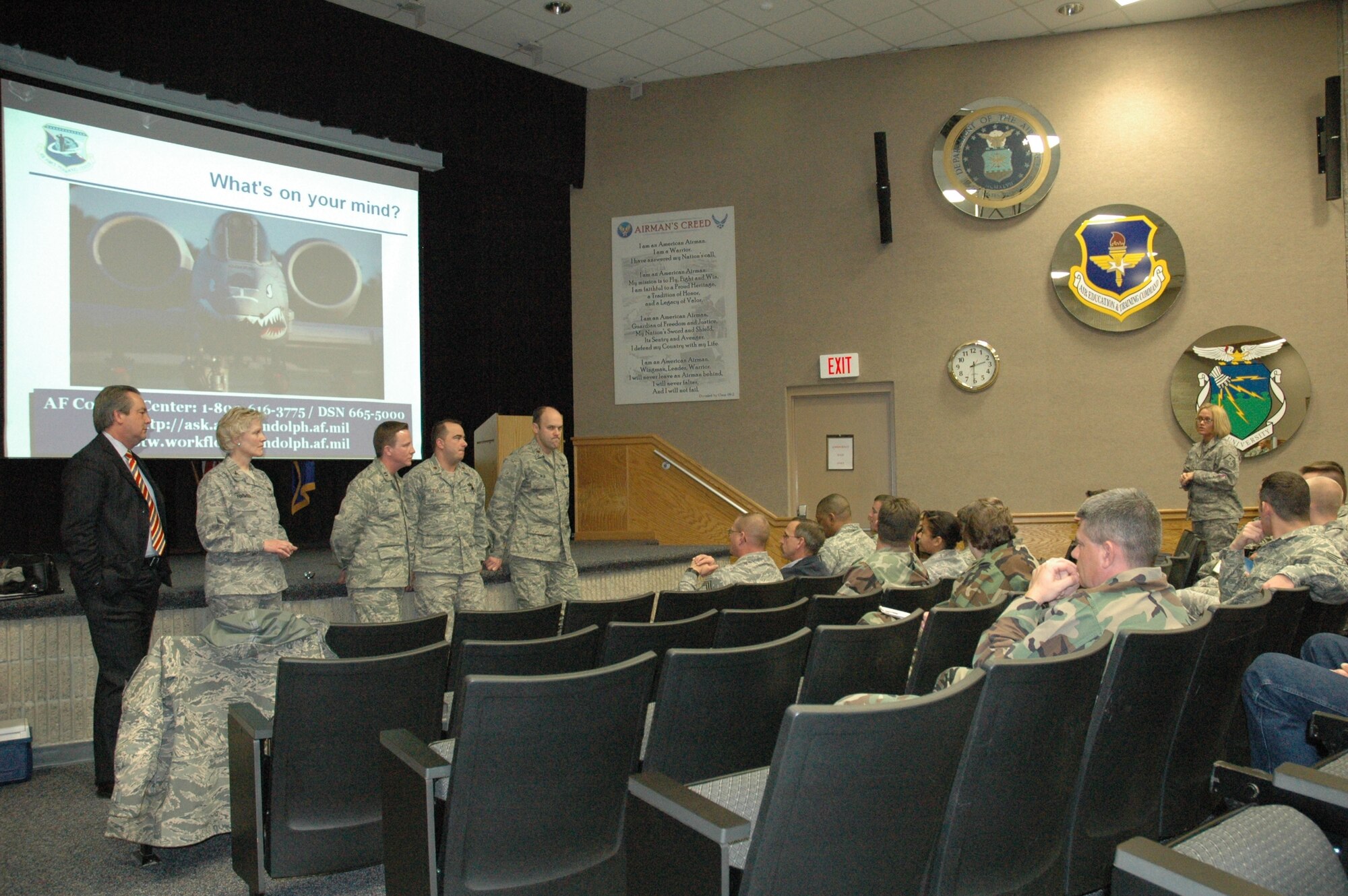 The Air Force Personnel Center "Spread the Word" briefing team, from Randolph Air Force Base, made a visit to Tyndall AFB to provide information on personnel issues and delivery transformation, as well as allows all Air Force members direct, face-to-face contact with AFPC personnel to address concerns and provide feedback.  (U.S. Air Force photo by Senior Airman Anthony J. Hyatt)