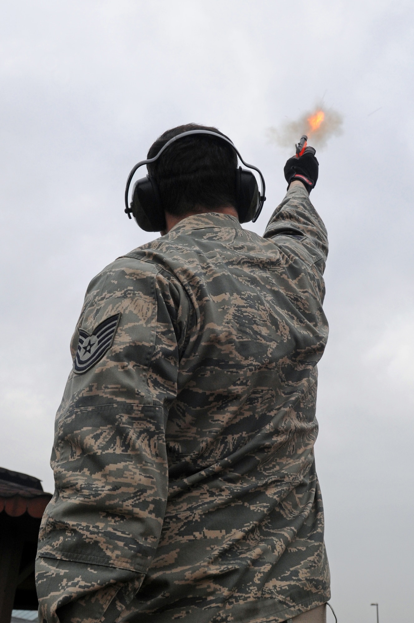 Tech. Sgt. Matthew Ludwig, 86th Operation Support Squadron Airfield Management non-commissioned officer in charge of training, fires a scare-away launcher during a Bird Aircraft Strike Hazard exercise Feb. 4, 2009, at Ramstein Air Base. The launcher is one method used to scare away any birds interfering with inbound or outbound flights. (U.S. Air Force photo by Airman 1st Class Grovert Fuentes-Contreras)
