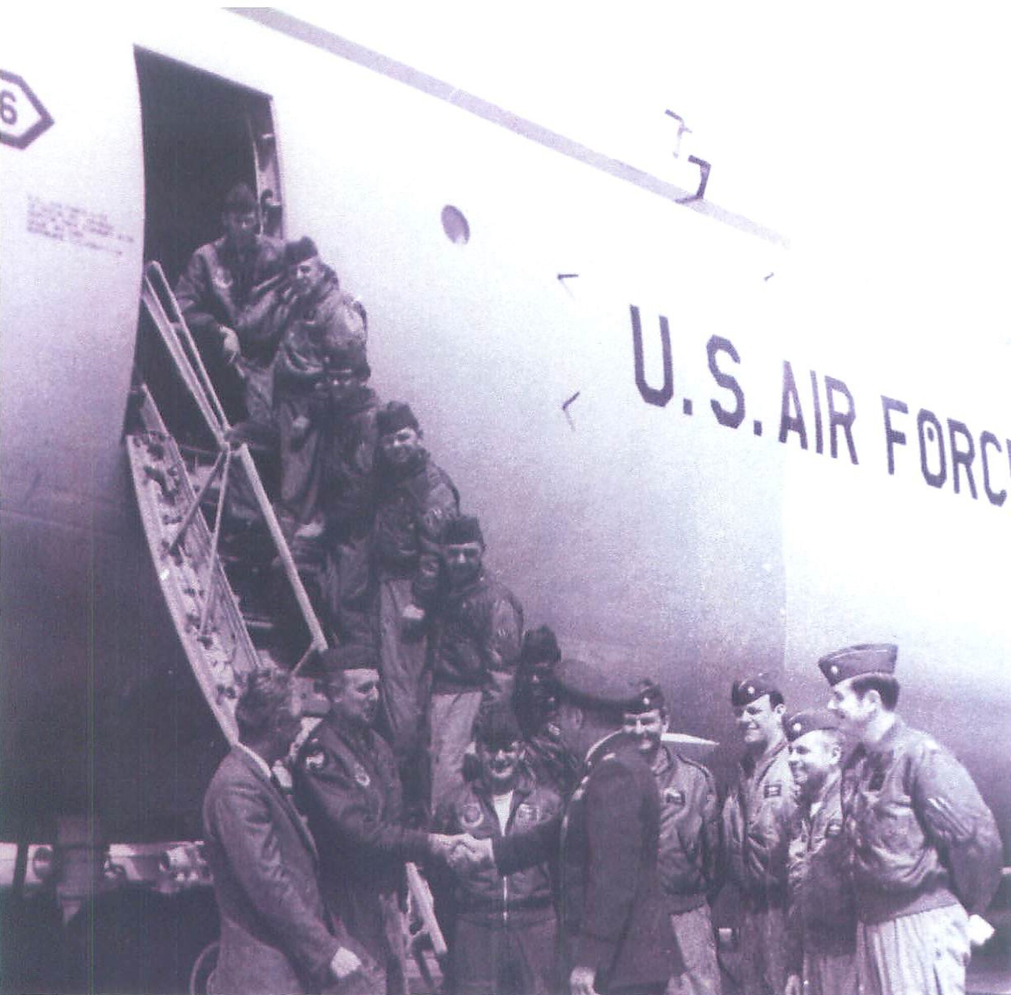 The crew who flew the first C-5 into Dover Air Force Base poses in front of the new Galaxy on Dover’s flighline April 16, 1971. Four of the crewmembers, Tom Dennis, Les Finney, Dr. Willie Curtis and Bob Valeski, were present once again on Dover AFB to witness a new era of military airlift Feb. 9, when Gen. Arthur J. Lichte, Air Mobility Command commander, delivered Team Dover’s first C-5M Super Galaxy named Spirit of Global Reach.  (Courtesy photo)