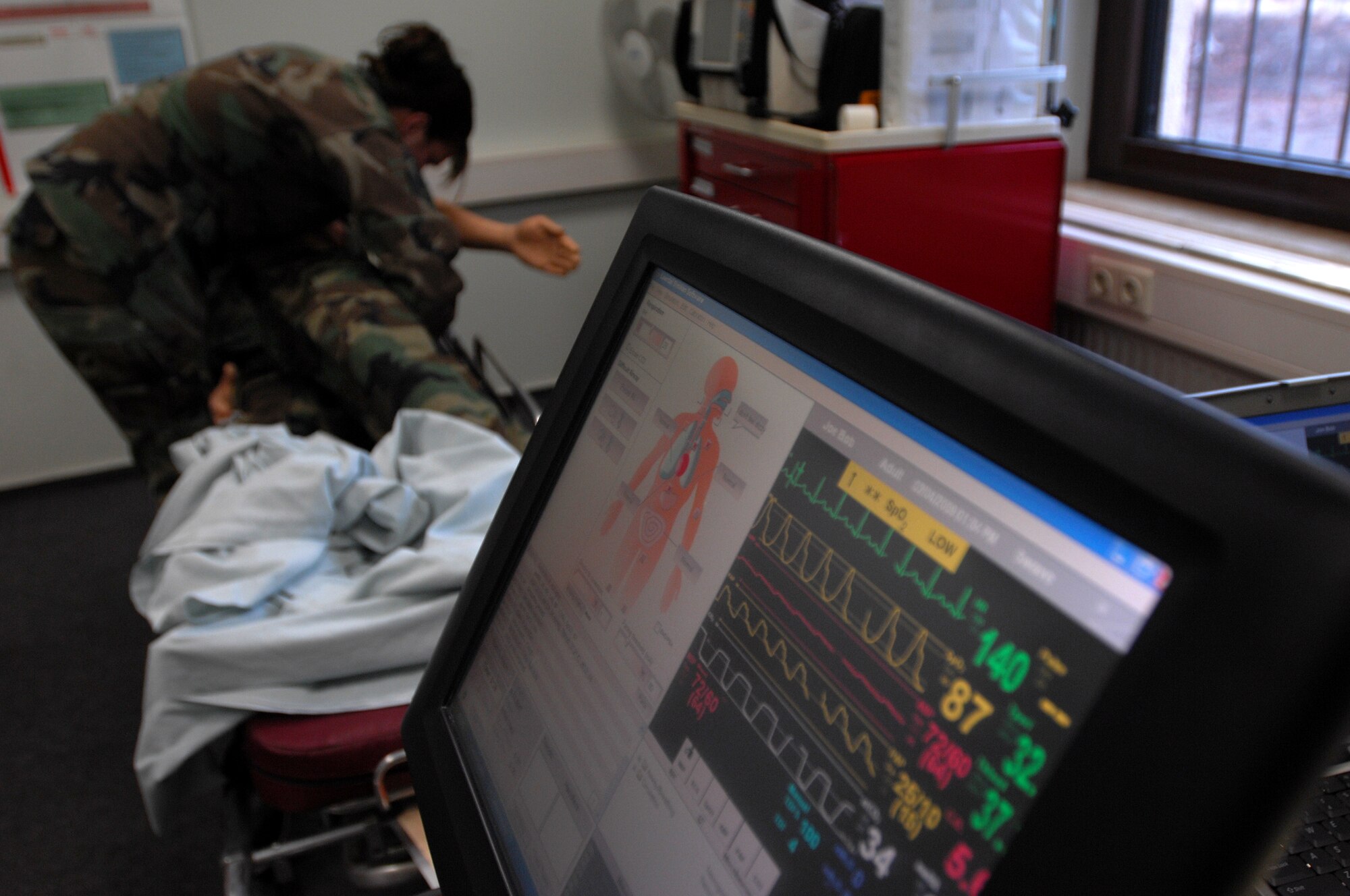 Firefighters and medics from all over U.S. Air Forces in Europe gathered Feb. 2, 2009, at Ramstein Air Base for a two-week Emergency Medical Technical Instructor course. The focus of the course was to ensure both firefighters and medics are taught the same information to keep accuracy between both carrier fields. Students received training on new information and applied their training during the hands-on portion of the course. (U.S. Air Force photo by Airman 1st Class Kenny Holston)