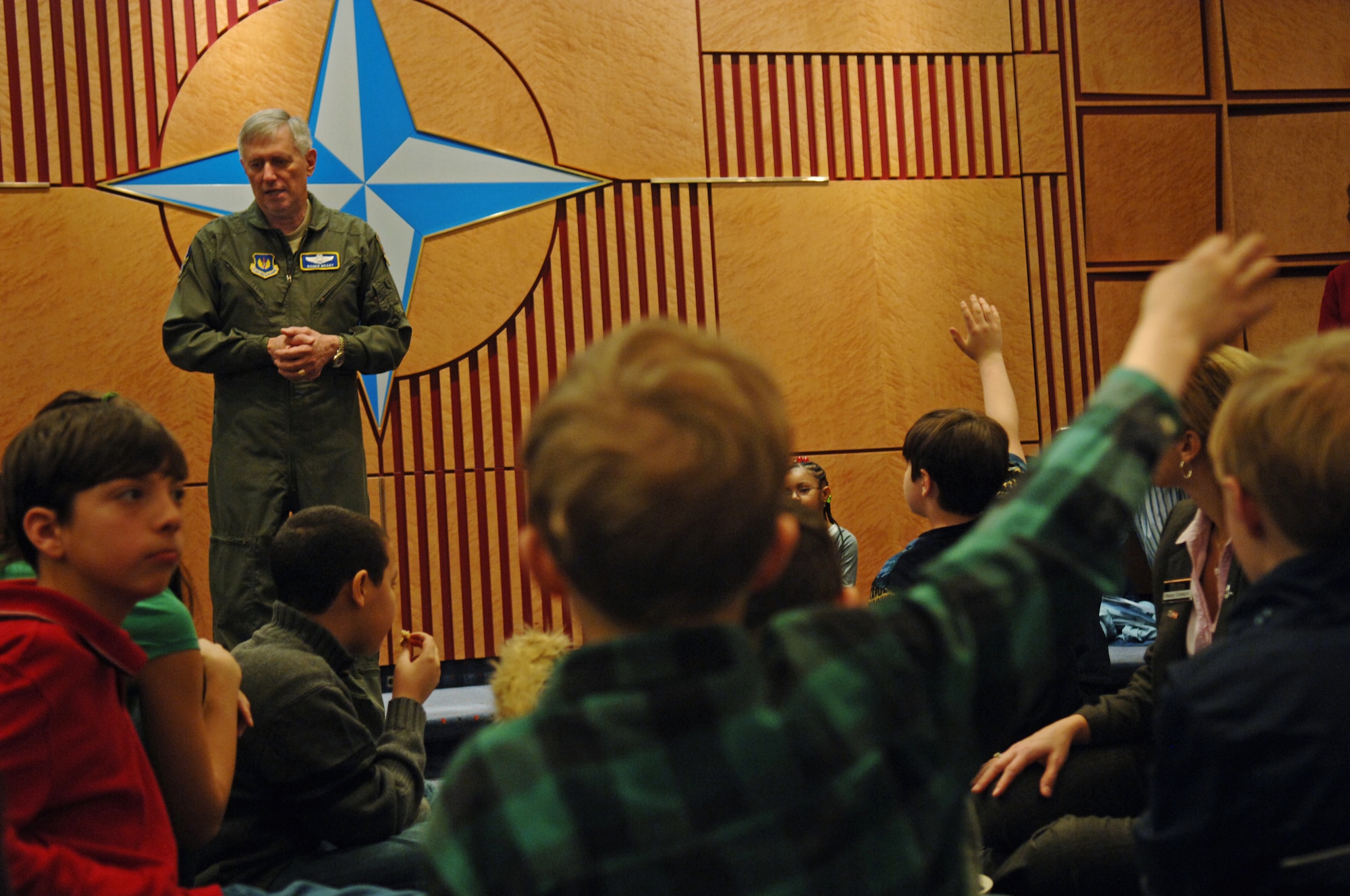 Gen. Roger A. Brady, U.S. Air Forces in Europe commander, speaks to more than 40 children of Headquarters USAFE members during Job Shadow Day Feb. 5, 2009, at Ramstein Air Base. General Brady talked to the children about his job as the commander, the importance of what their parents do for the Air Force while living and working in Europe and then answered questions on a variety of topics. (U.S.Air Force photo by Senior Airman Levi Riendeau)