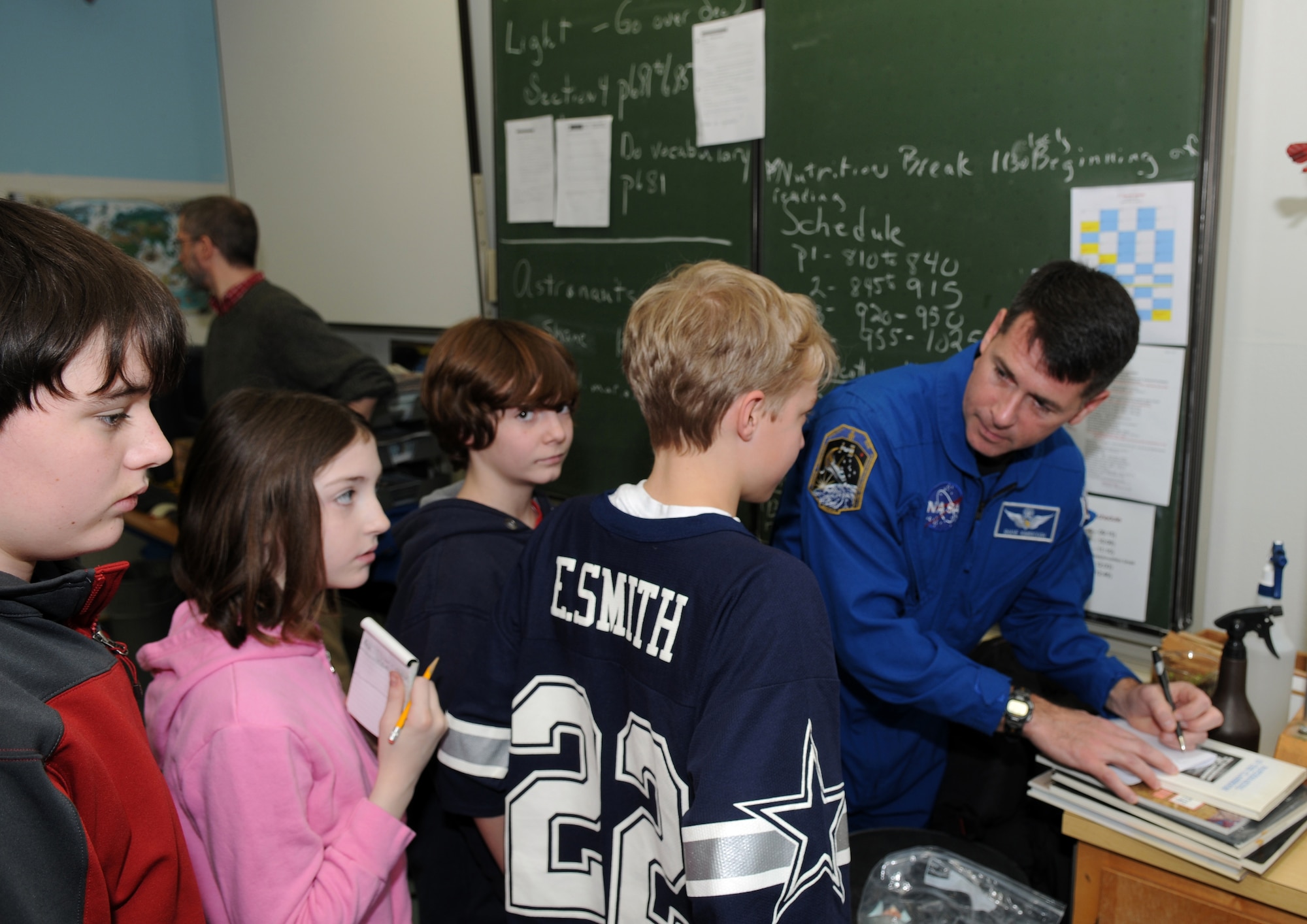Army Lt. Col. Robert Kimbrough, NASA Astronaut, talks with Ramstein Middle School students during a visit to Ramstein Air Base Feb. 4, 2009. Colonel Kimbrough was one of six astronauts who participated in an Armed Forces Entertainment tour to visit troops downrange and students in the Kaiserslautern Military Community. (U.S. Air Force photo by Airman 1st Class Scott Saldukas)
