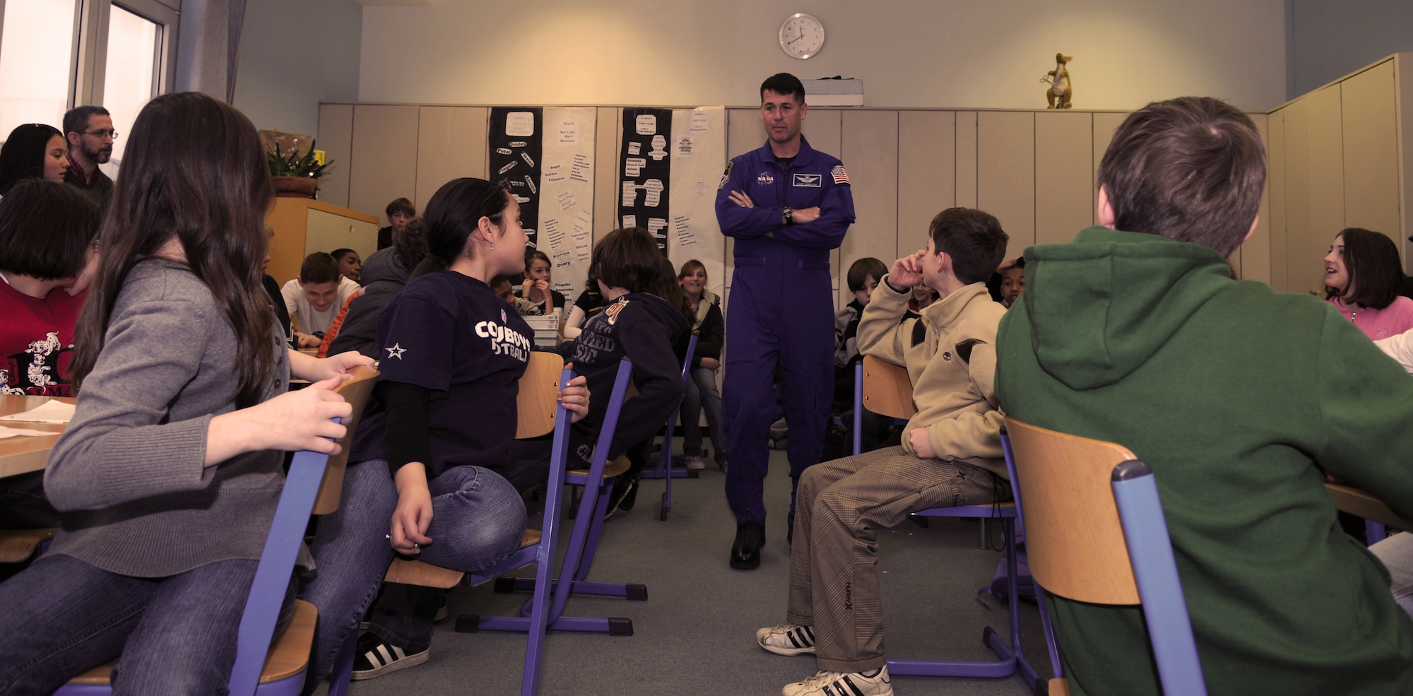 Army Lt. Col. Robert Kimbrough, NASA Astronaut, talks with Ramstein Middle School students during a Feb. 4 visit to Ramstein Air Base Germany. Colonel Kimbrough was one of six astronauts that participated in an Armed Forces Entertainment tour to visit troops down range and students in the Kaiserslaurtern Military Community.(U.S. Air Force photo by Airman 1st Class Scott Saldukas)