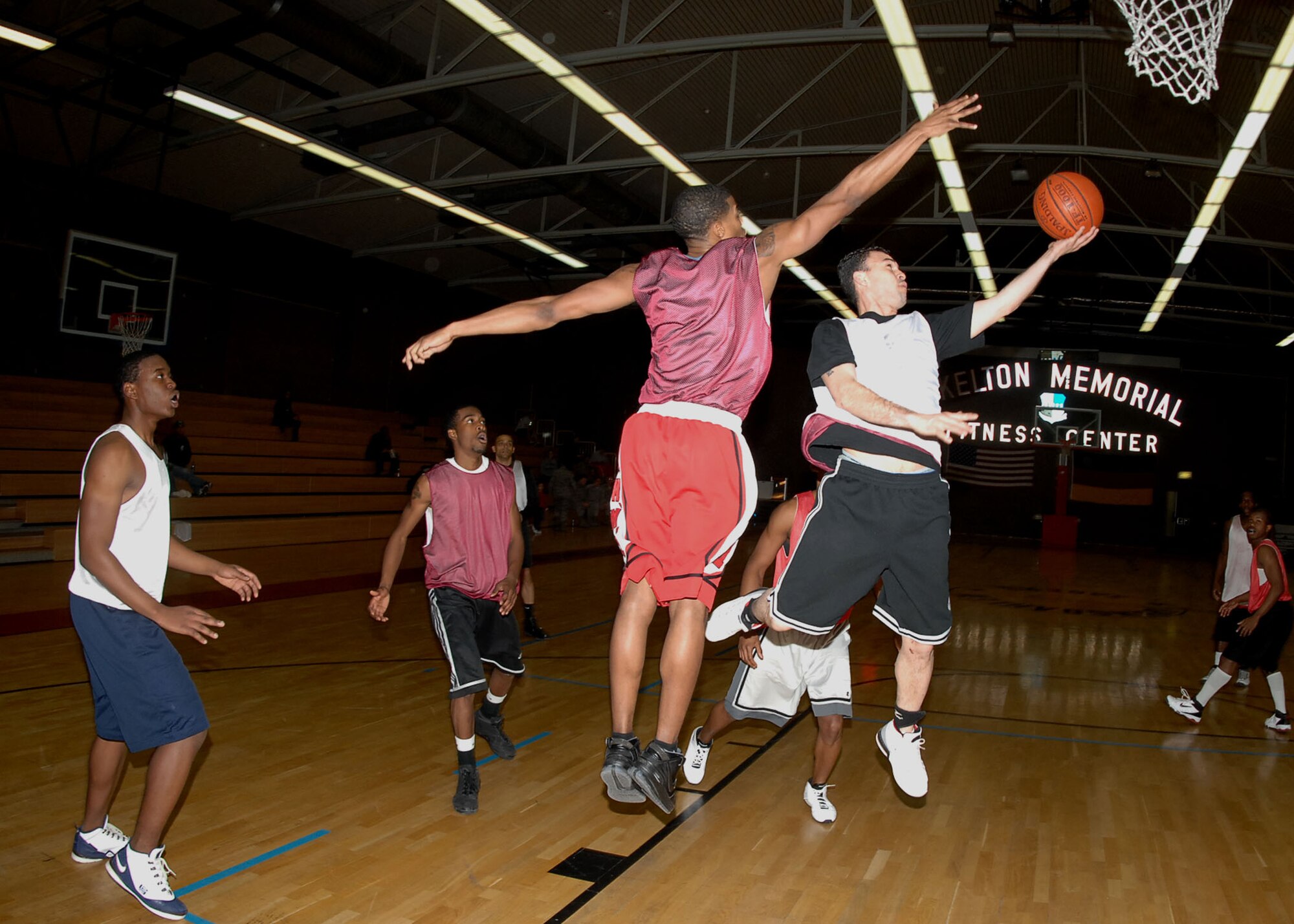 SPANGDAHLEM AIR BASE, Germany -- Staff Sgt. Marcus Freeman, 52nd Communications Squadron, makes a layup during an intramural playoff game Jan. 29, 2009. The 52nd CS defeated the 52nd SFS with a score of 53-44 to advance in the tournament. (U.S. Air force photo by Airman 1st Class Nicholas Wilson)