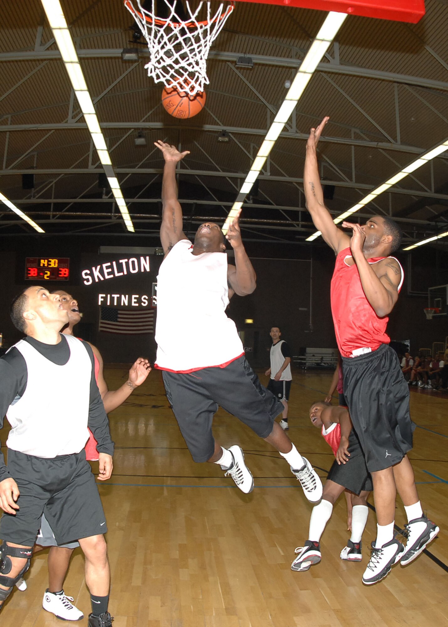 SPANGDAHLEM AIR BASE, Germany -- Airman 1st Class Maurice Hardy, 52nd Communications Squadron, makes a layup during an intramural playoff game Jan. 29, 2009. The 52nd CS defeated the 52nd SFS with a score of 53-44 to advance in the tournament.  (U.S. Air force photo by Airman 1st Class Nicholas Wilson)