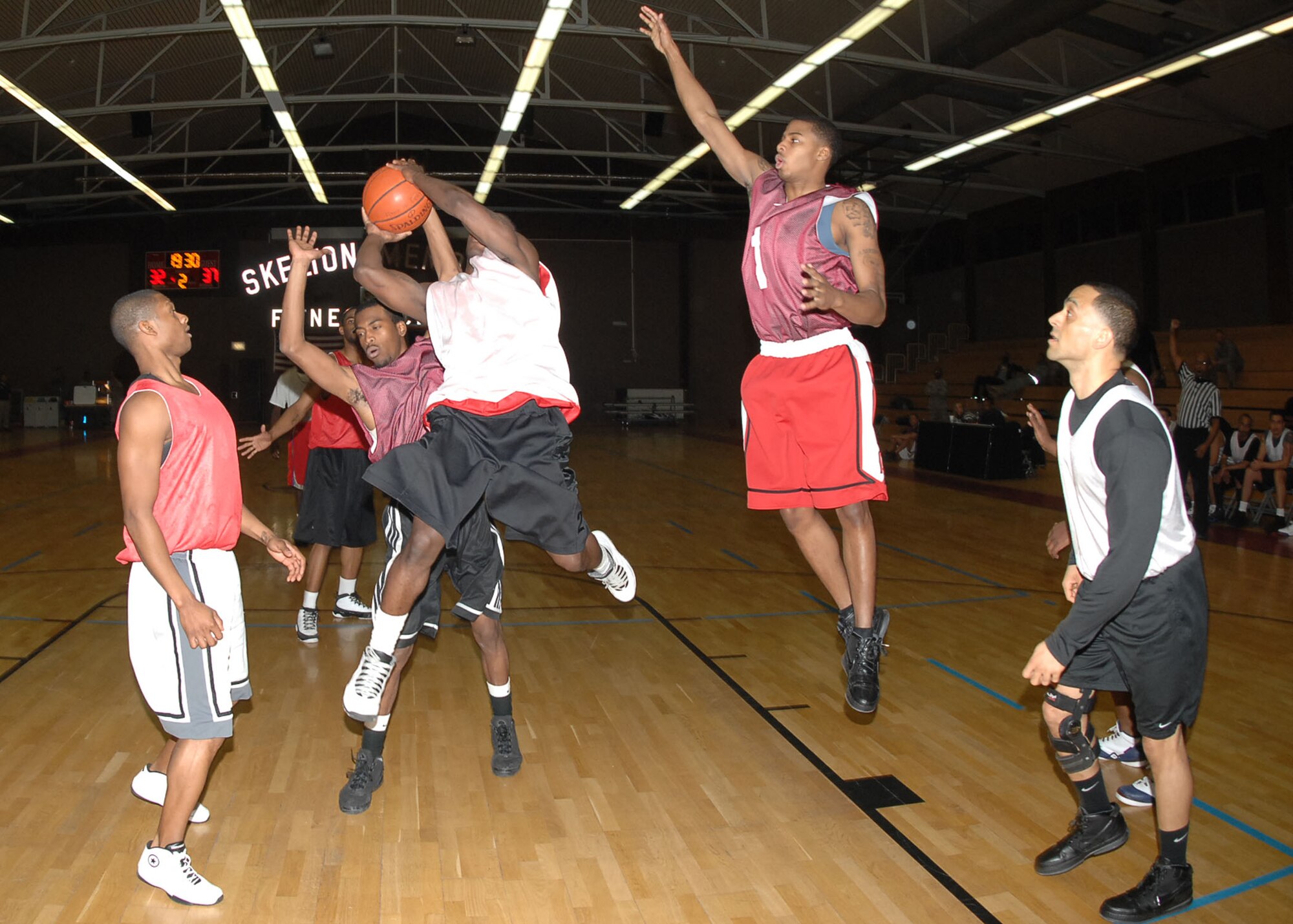 SPANGDAHLEM AIR BASE, Germany -- Airman 1st Class Maurice Hardy, 52nd Communications Squadron, makes a layup during an intramural playoff game Jan. 29, 2009. The 52nd CS defeated the 52nd SFS with a score of 53-44 to advance in the tournament.  (U.S. Air force photo by Airman 1st Class Nicholas Wilson)