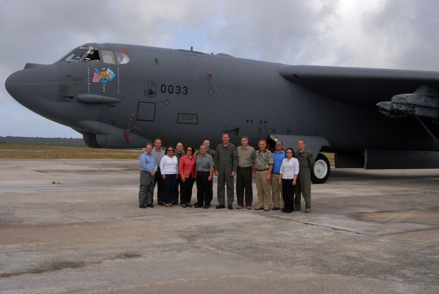 Members of the 23rd Expeditionary Bomb Squadron and Guam Chamber of Commerce pose in front of a B-52 Stratofortress during an orientation visit to Andersen Air Force Base, Guam, Feb. 10.  Members of the 23rd EBS, deployed from Minot Air Force Base, N.D., in support of Andersens Global Deterrence mission,  briefed members of the Chamber of Commerce on the capabilities that the 23rd EBS brings to the Pacific region. (U.S. Air Force photo by Senior Airman Ryan Whitney)