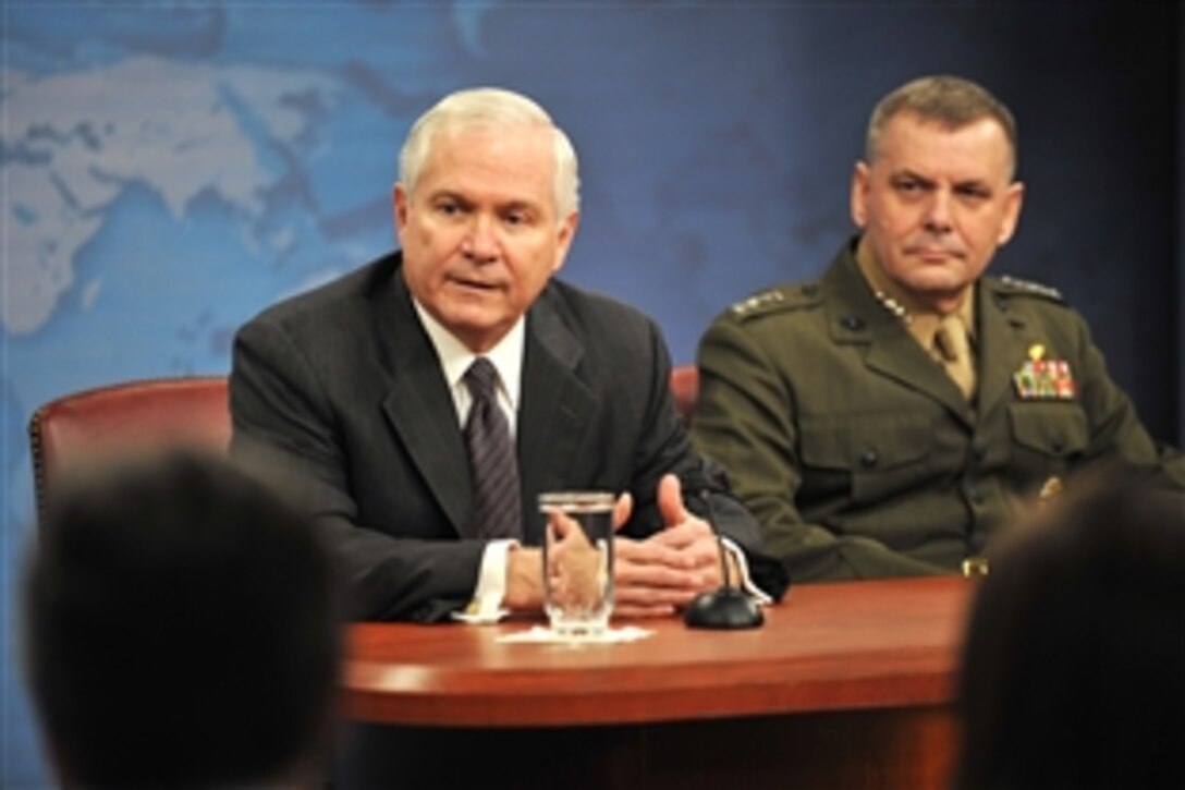 Defense Secretary Robert M. Gates and Vice Chairman of the Joint Chiefs of Staff Marine Gen. James E. Cartwright speak with members of the press during a briefing at the Pentagon, Feb. 10, 2009.