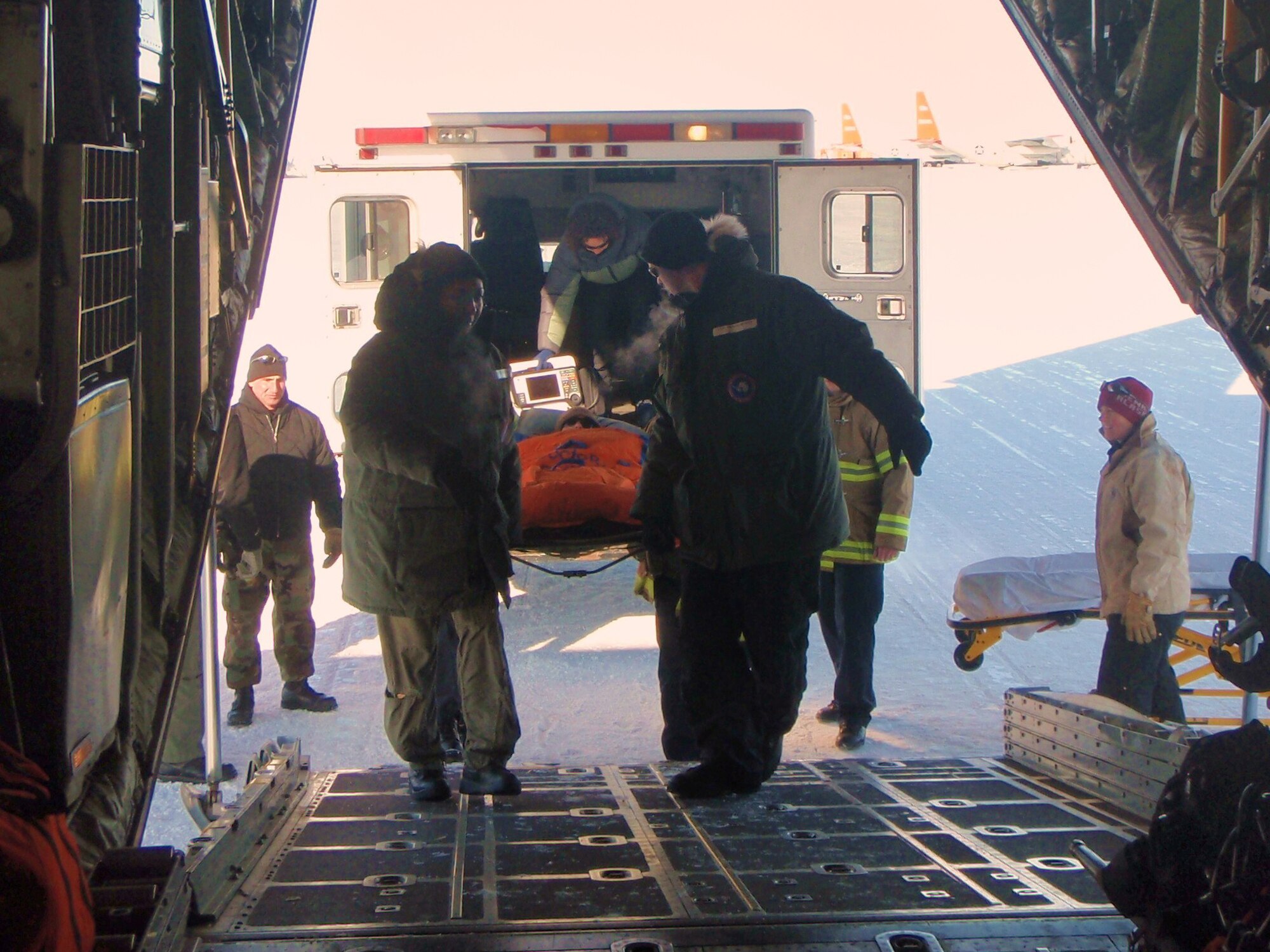 Members of the 18th Aeromedical Evacuation Squadron, Kadena Air Base, Japan, transport an urgent care patient by airlift to New Zealand for medical care. The members conducted medical evacuation missions over a three-month period at McMurdo Station, Antarctica.
(U.S. Air Force courtesy photo)