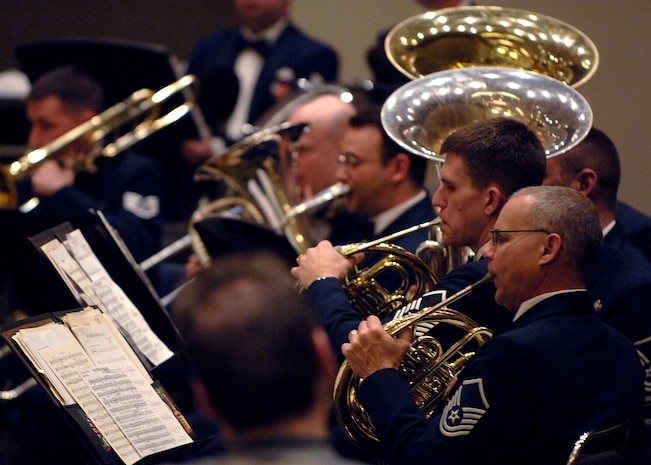 Airmen of the United States Air Force Heritage of America Band perform the song Interlochen Bowl March by Edwin Franko Goldman at the Charleston Coliseum Feb. 6. The Heritage of America Band is comprised of 47 professional active-duty musicians who perform for more than 1 million people each year in venues from formal, informal and even Major League Baseball and NASCAR. (U.S. Air Force photo/Senior Airman Timothy Taylor)
