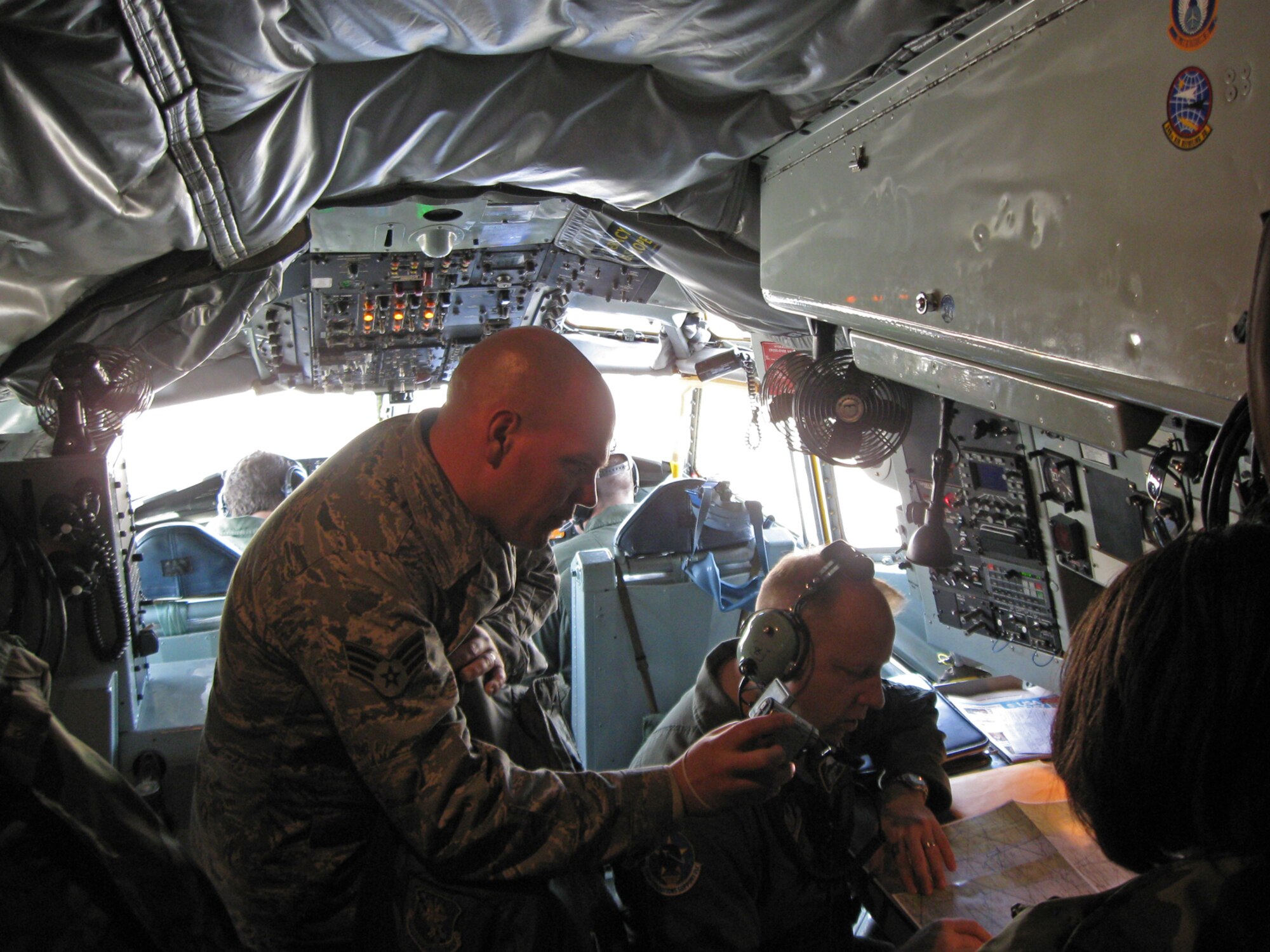 Senior Airman Daniel Blondell records the experience of flying on a KC-135 Stratotanker during an air refueling mission. He and other Reservists from the 931st Air Refueling Group took part in an incentive flight designed to show them them air refueling up close. Airman Blondell is assigned to the 931st Aircraft Maintenance Squadron, an Air Force Reserve unit at McConnell Air Force Base, Kan. (U.S. Air Force photo/Staff Sgt. Jay Guldjord)