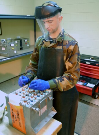 Senior Airman David Stricker performs a voltage check on an aircraft battery in the 437th Maintenance Squadron Electrical and Environmental Battery Shop Feb. 11. The ELEN battery shop is responsible for maintaining all the C-17 batteries for Charleston AFB. Airman Stricker is an electrical and environmental systems journeyman with the 437 MXS. (U.S. Air Force photo/Airman Ian Hoachlander)