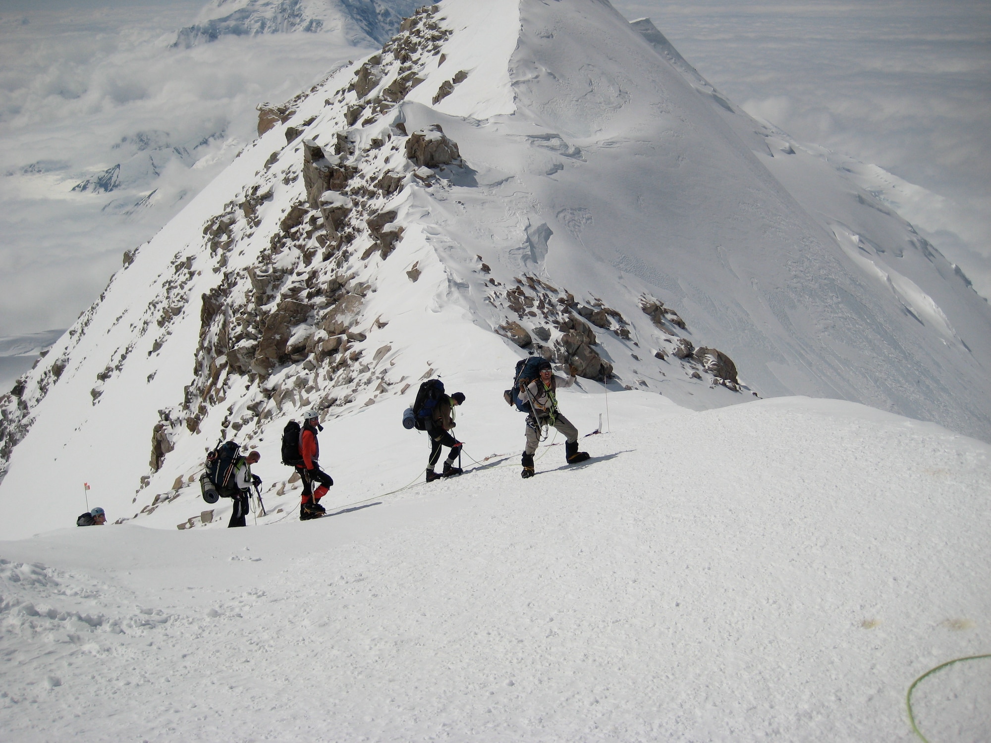 A group of climbers with the U.S. Air Force Seven Summits Challenge scale the West Buttress of 20,300-foot Mount McKinley, Alaska in June 2008. The challenge, founded by Capt. Rob Marshall, 8th Special Operations Squadron, and Capt. Mark Uberuaga, 55th Rescue Squadron, aims to lead a team of Air Force members to the top of the highest mountain on each continent and serves as a fundraiser for the Special Operations Warrior Foundation. (U.S. Air Force photo by Capt. Mark Uberuaga)