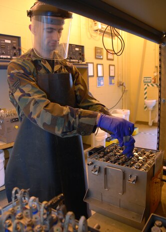 Senior Airman David Stricker performs an electrolyte test on an aircraft battery in the 437th Maintenance Squadron Electrical and Environmental Battery Shop Feb. 11. The ELEN battery shop is responsible for maintaining all the C-17 batteries for Charleston AFB. Airman Stricker is an electrical and environmental systems journeyman with the 437 MXS. (U.S. Air Force photo/Airman Ian Hoachlander)