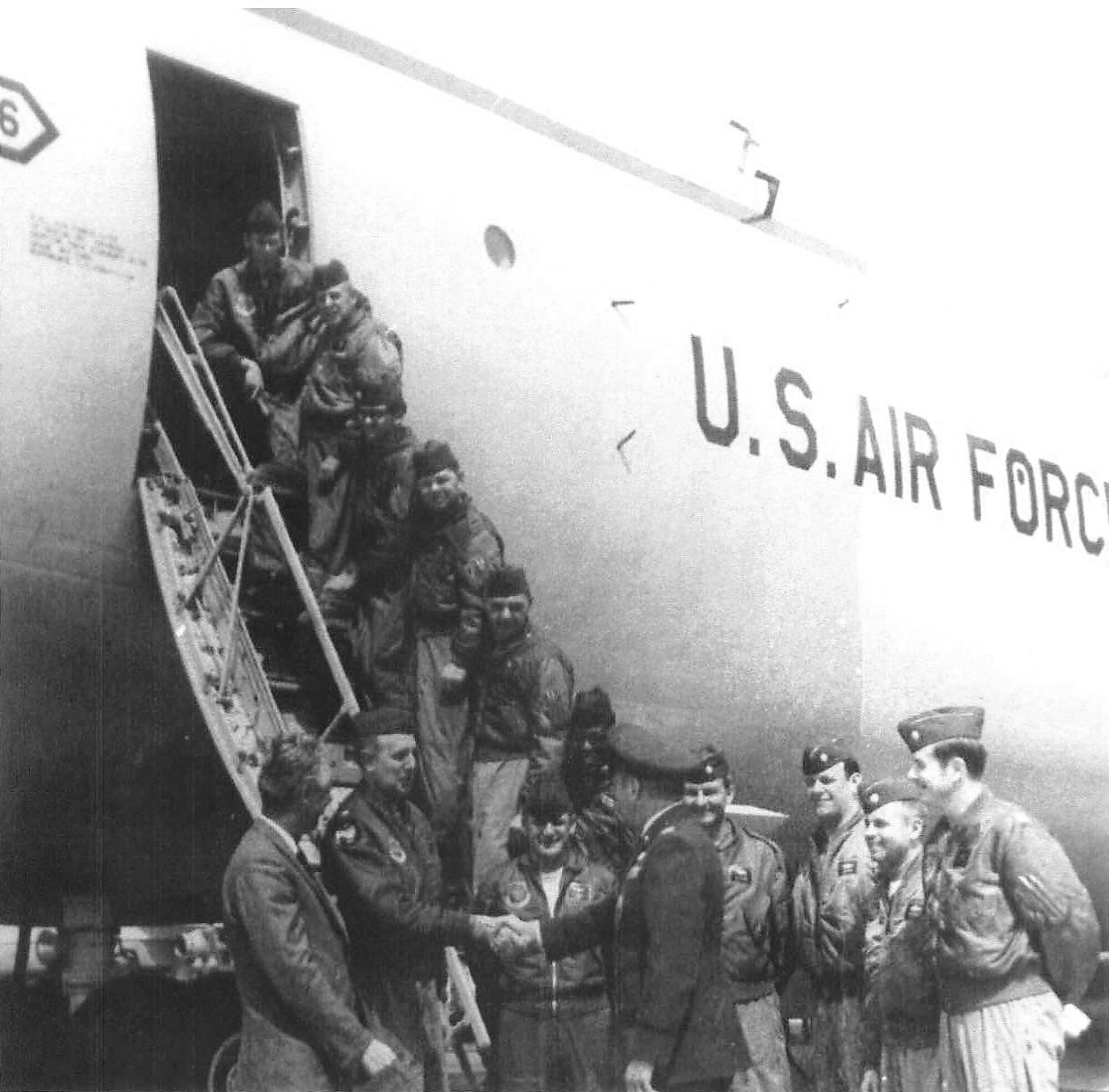 The crew who flew the first C-5 Galaxy into Dover Air Force Base, Del., poses in front of the new Galaxy on Dover's flighline April 16, 1971. Four of the crewmembers, Tom Dennis, Les Finney, Dr. Willie Curtis and Bob Valeski, were present once again on Dover AFB to witness a new era of military airlift Feb. 9, when Gen. Arthur J. Lichte, Air Mobility Command commander, delivered Team Dover's first C-5M Super Galaxy named Spirit of Global Reach. (Courtesy photo) 
