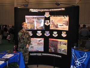 2nd Lt. Alyssa Psota, 30th Intelligence Squadron, talks to high school students during the Youth Career Expo held at the Hampton Roads Convention Center Feb. 10. The Youth Career Expo showcases multiple industries, careers and vocations, giving young adults opportunities to explore and ask questions about the various career choices open to them.
(Air Force Photo/1st Lt. James Keohane) 
