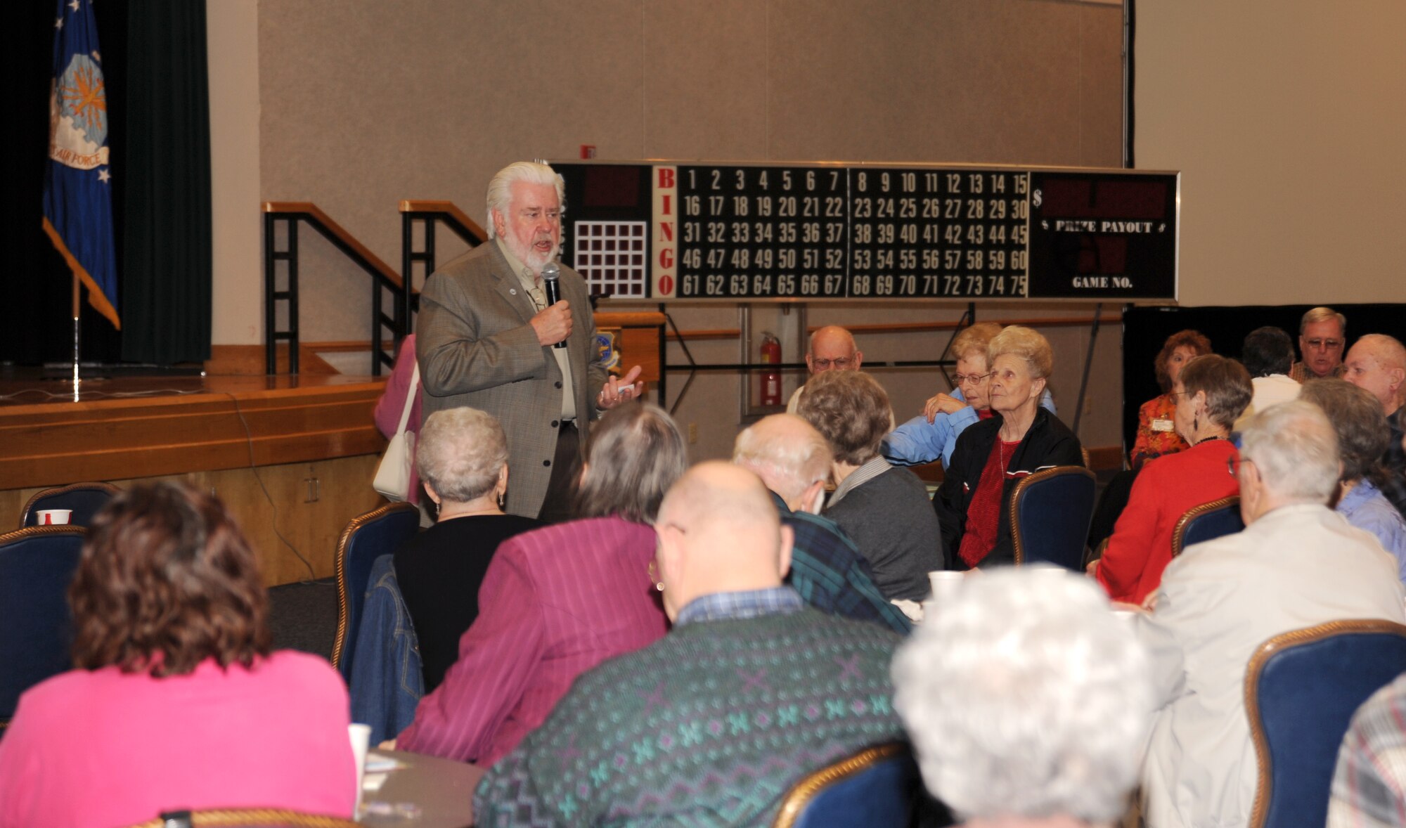 MCCONNELL AIR FORCE BASE, Kan. -- Tim Norton, Sedgwick County Commissioner, visits with retirees during a luncheon held at the Robert J. Dole Community Center Ballroom, Feb. 10. Retiree luncheons normally consist of guest speakers, civilian and active duty, matters of business for future meetings and activities. (Photo by Senior Airman Laura Suttles)