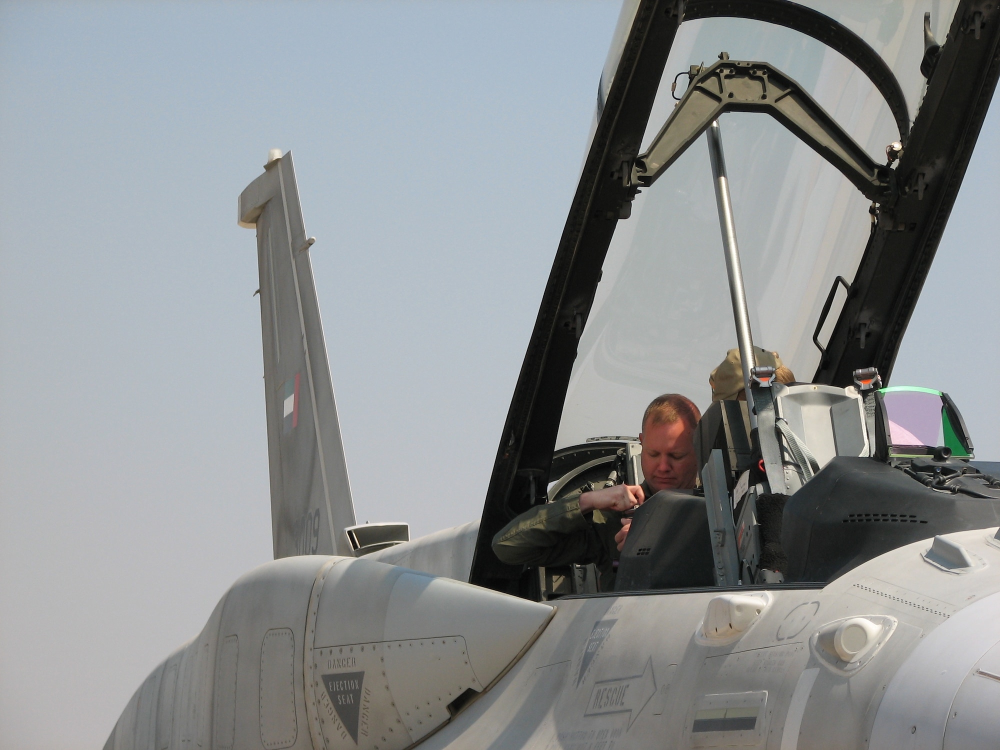 Lt. Col. Mike Benham, 13th Air Force chief of safety at Hickam Air Force Base, Hawaii, gets ready for an orientation flight on a United Arab Emirates F-16 Block 60 at the Aero India 09 air show at Air Force Station Yelahanaka, India, on Feb. 9.  Colonel Benham is acting as operations officer for the U.S. aircraft and personnel at the air show, which runs through Feb. 11. (U.S. Air Force photo by Maj. Sam Highley)