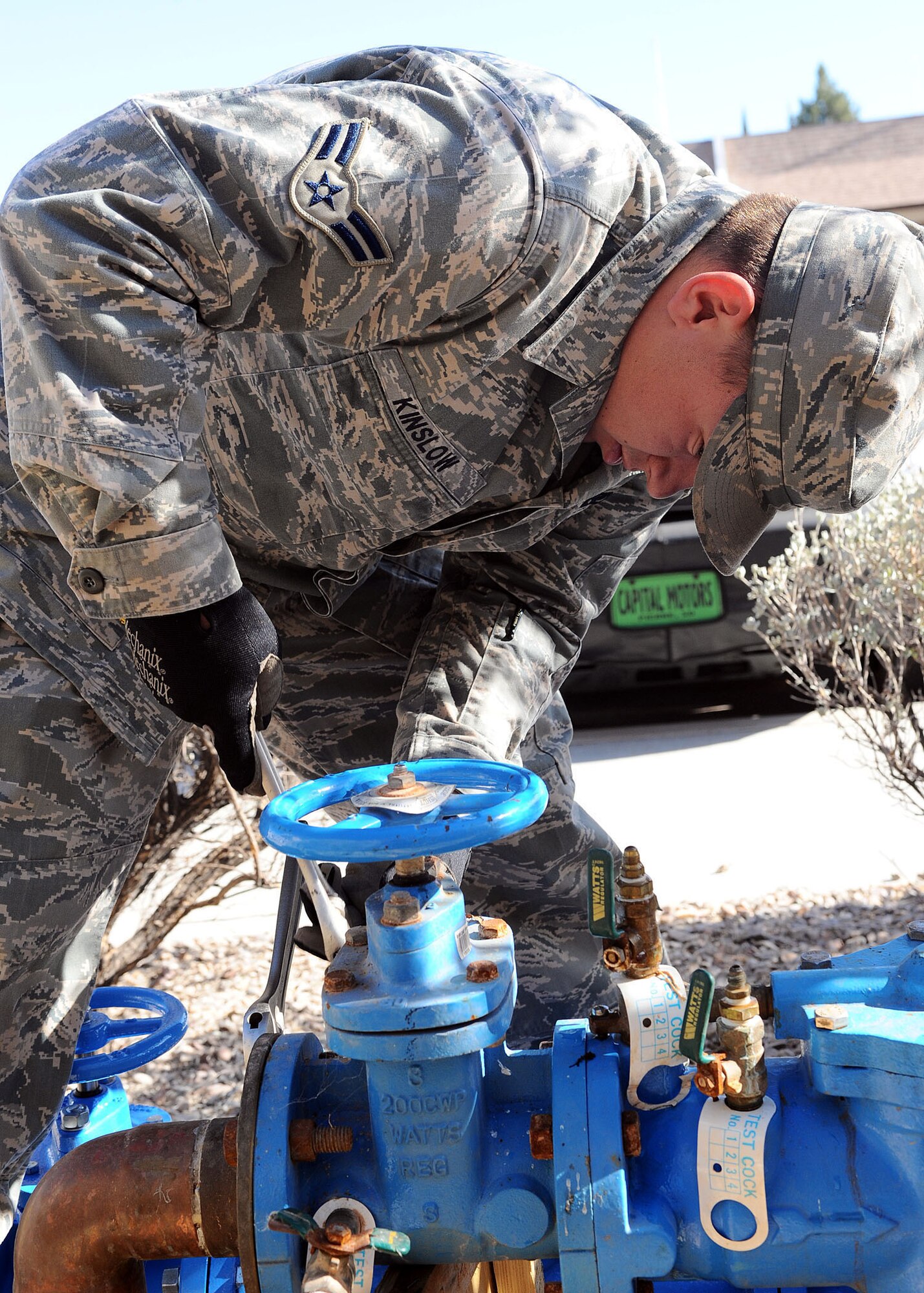 Airman 1st Class Jake Kinslow, 49th Civil Engineer Squadron, repairs a water main outside of building 224 at Holloman Air Force Base, N.M., Feb. 6. Airman Kinslow worked diligently to fix the problem. (U.S Air Force photo/ Airman 1st Class DeAndre Curtiss)