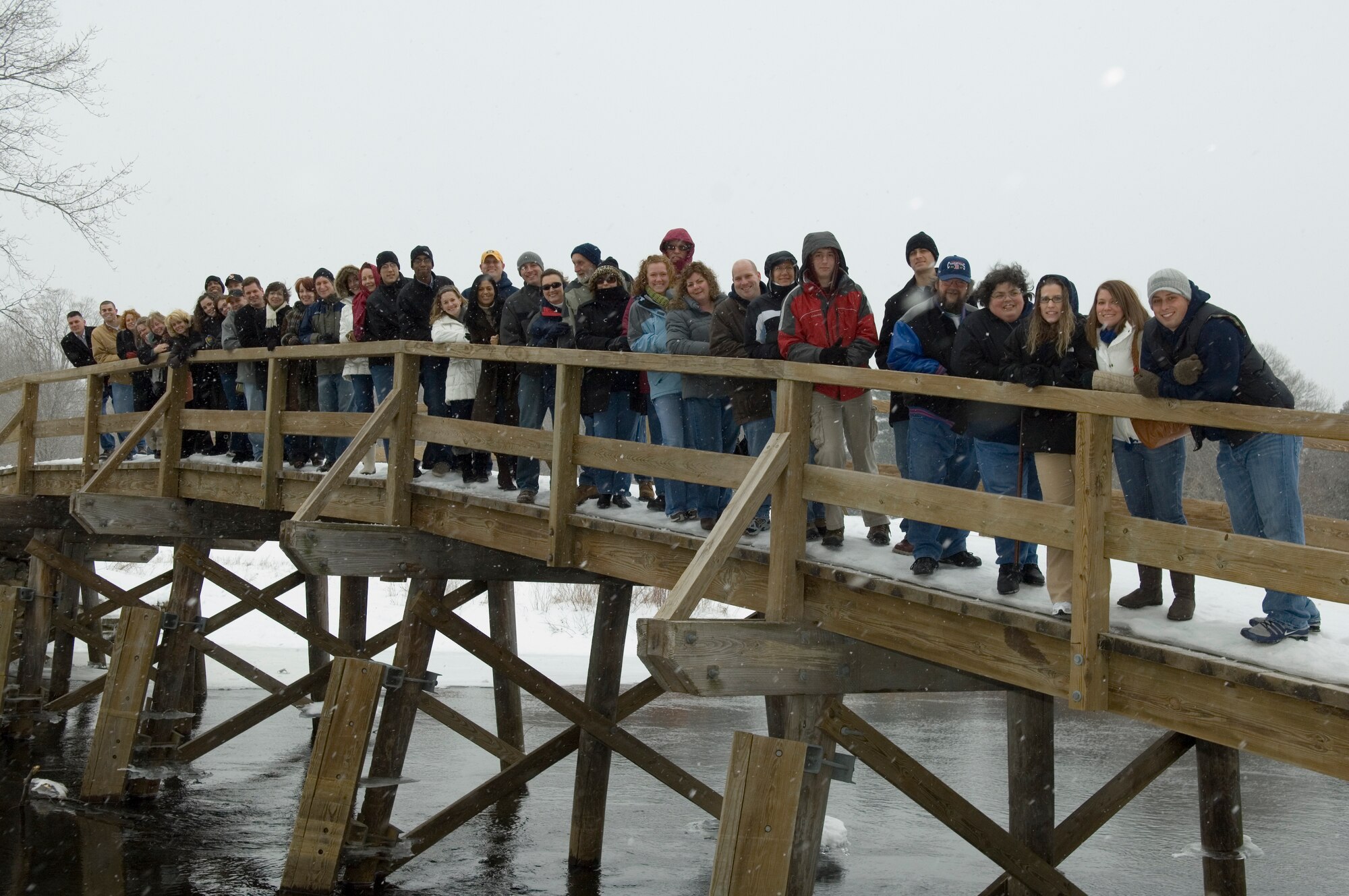HANSCOM AIR FORCE BASE, Mass. – The 66th Air Base Wing Annual Awards nominees stop for a moment at the Old North Bridge in Concord, Mass., during their tour of the local area. All nominees were treated to a week-long celebration. The winners were announced on Feb. 6 at a ceremony at the Minuteman Club. (U.S. Air Force photo by Rick Berry) 
