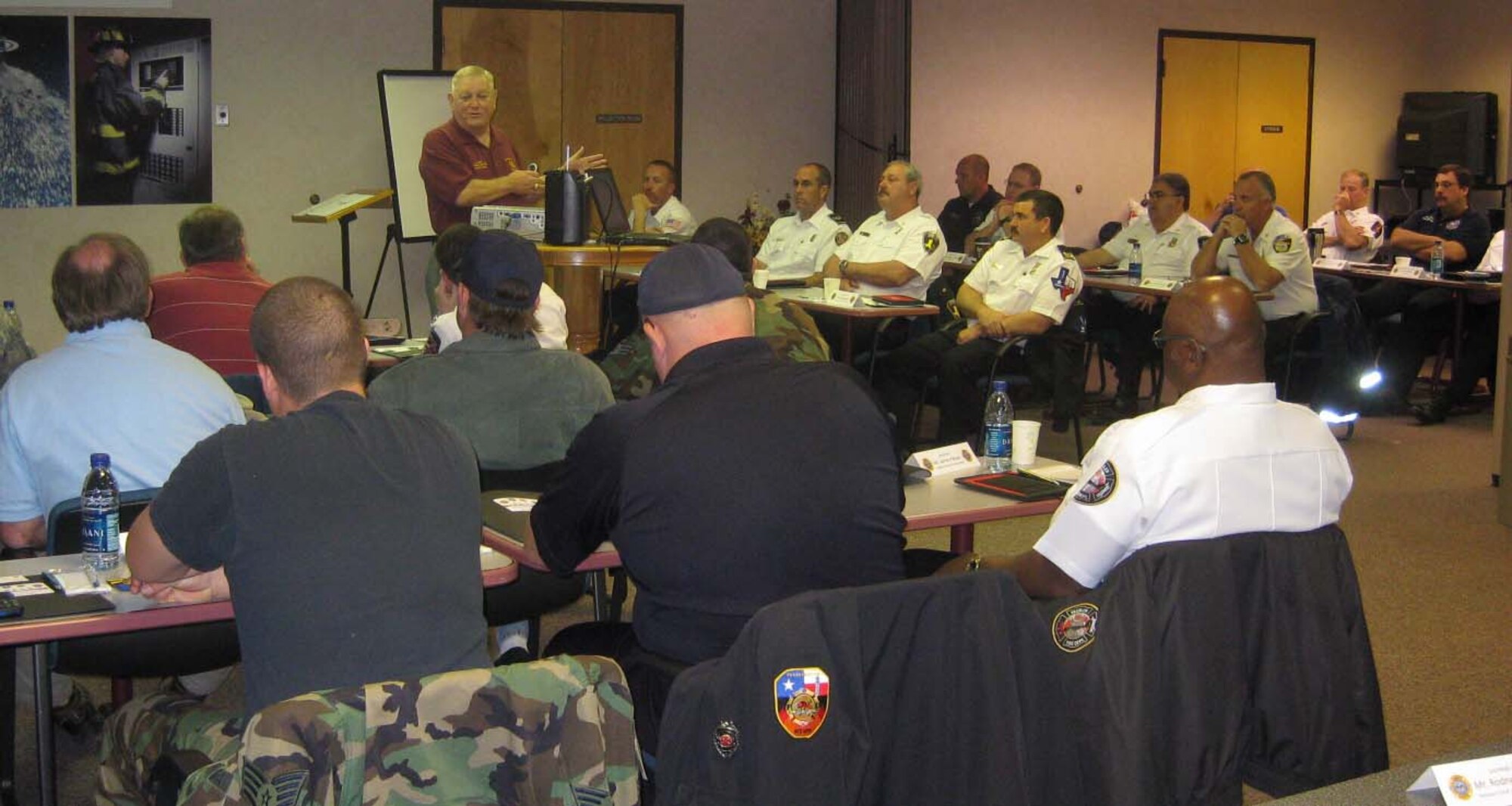 Air Education and Training Command Fire Chief Charles Byrd discusses the future of the Fire Safety Deficiency Program during the 2009 Department of Defense Fire Prevention Symposium Feb. 4 at Sheppard Air Force Base, Texas. The FSD was one of many topics discussed during the week-long meeting that consisted of Air Force, Army and DoD fire officials. (Courtesy photos)